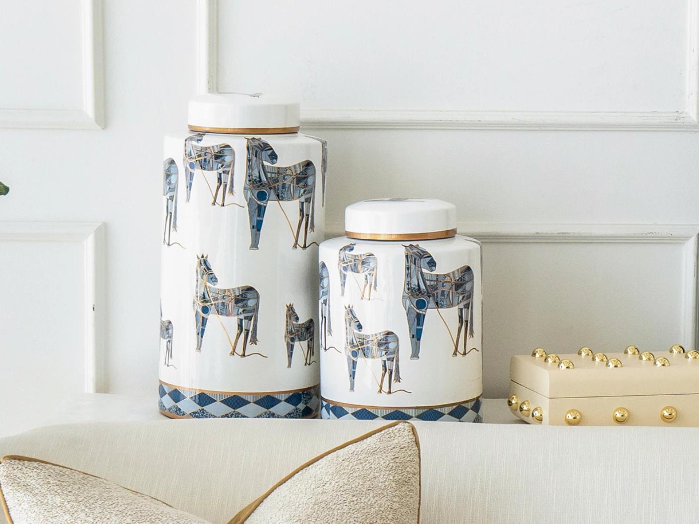 Eloisa Bundle canisters in white and blue, shown in a lifestyle front view as image 6