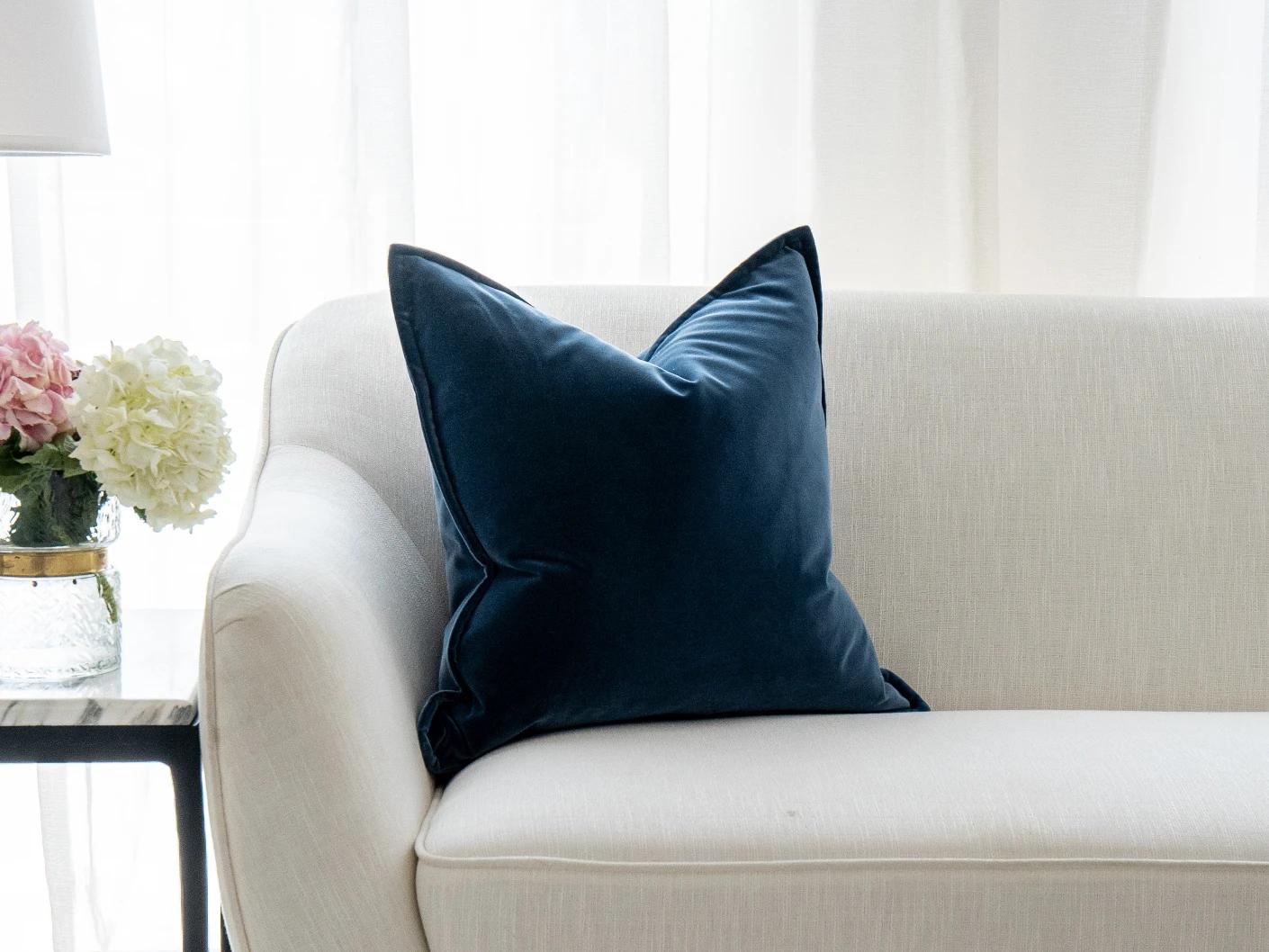 Alessandra Canova cushion in royal blue and blue, shown in a lifestyle front view as image 5