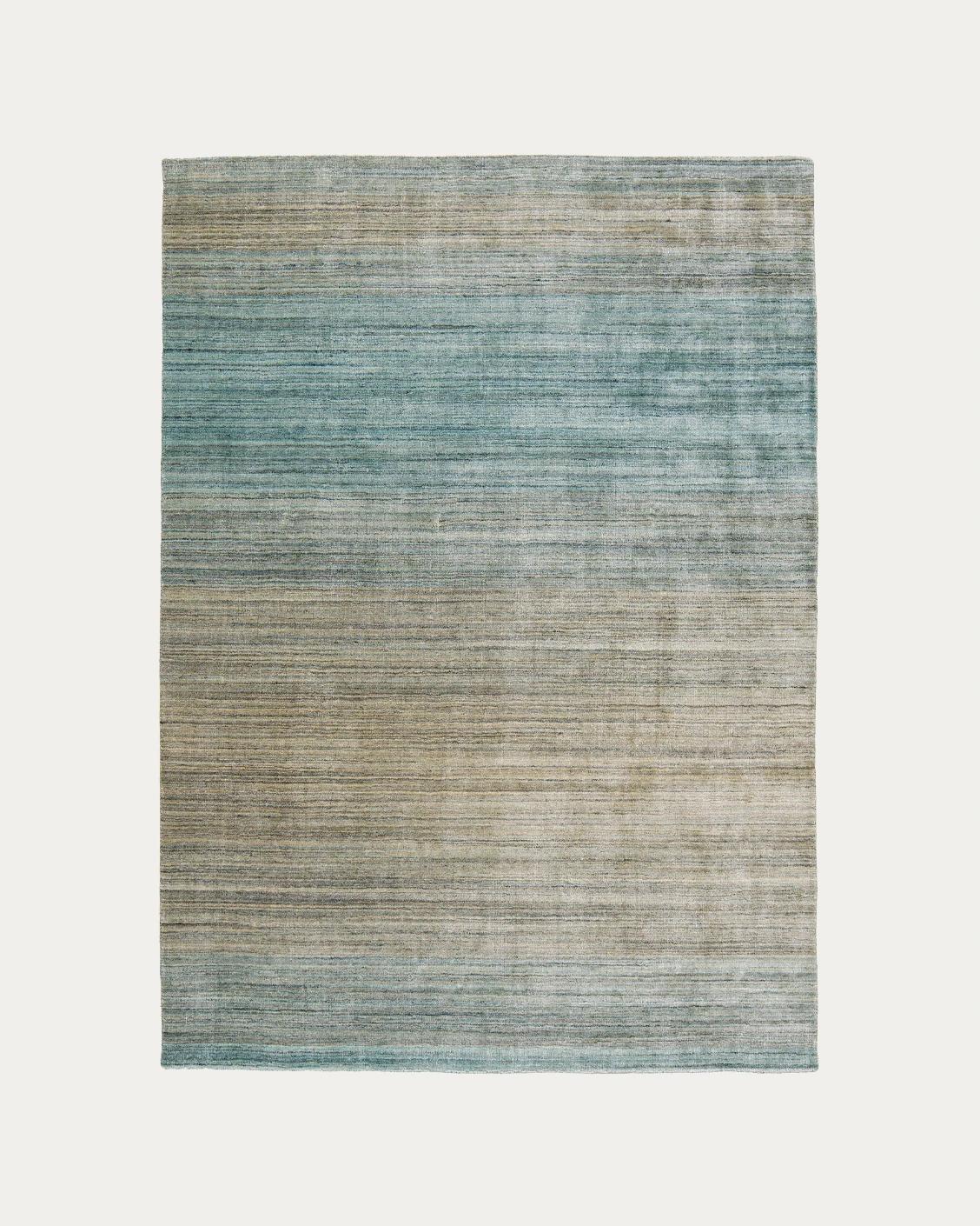Ava Sandy carpets in turquoise and beige, shown in a product top view as image 1