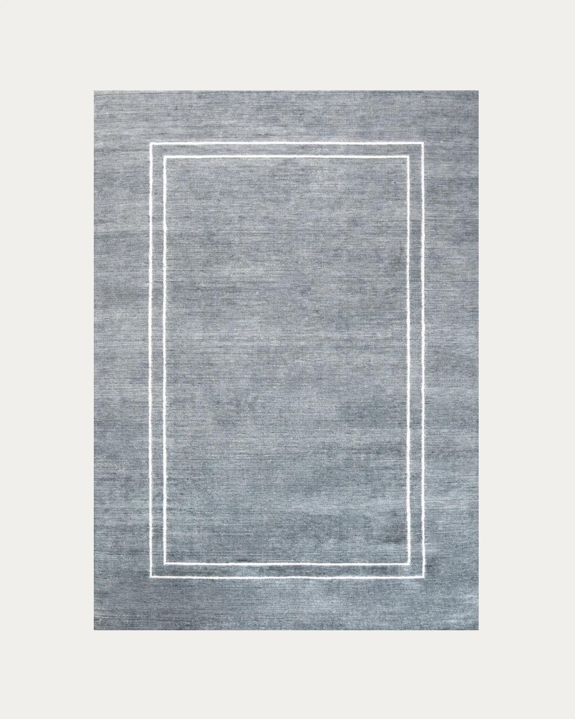 Colin Ashton carpets in blue and white, shown in a product top view as image 1