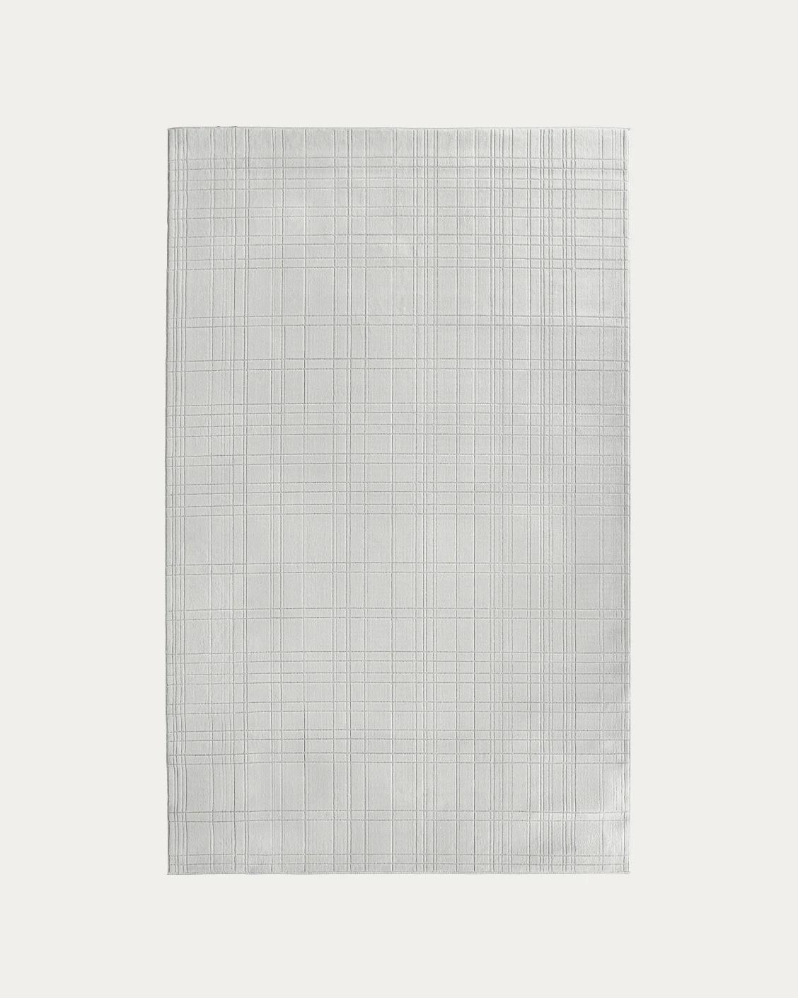 Corvin Sandy carpets in ivory and grey, shown in a product top view as image 1