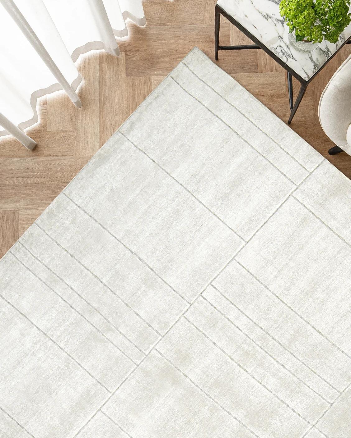 Elliot Bianca carpet in white and pearl, shown in a lifestyle top view as image 2