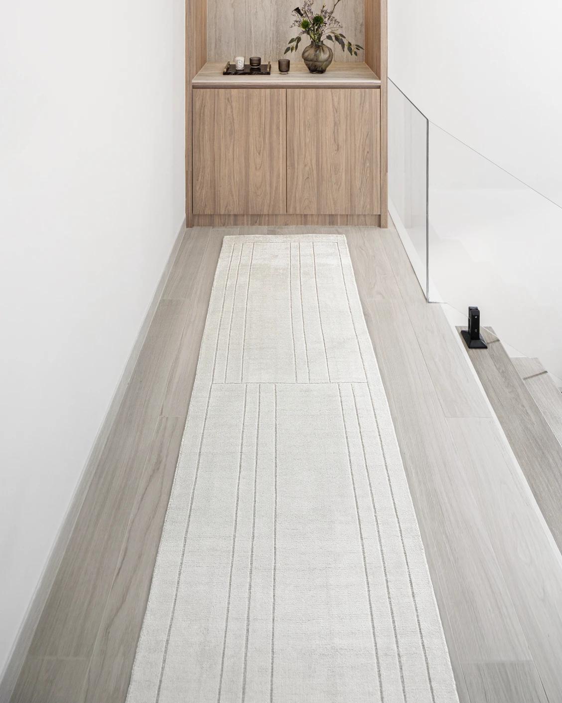 Elliot Bianca Runners carpet in white and pearl, shown in a lifestyle front view