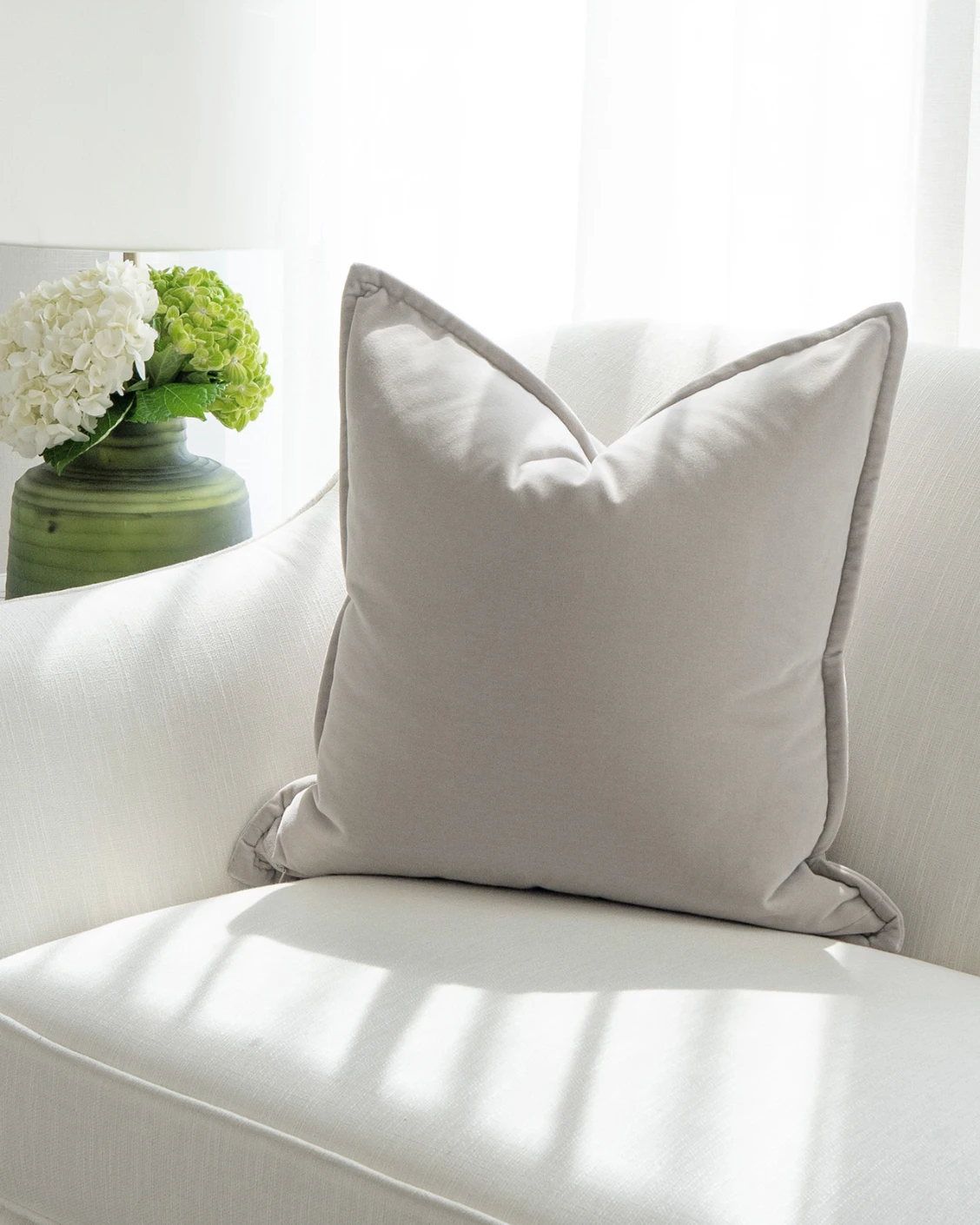 Alessandra Klimt cushion in beige, shown in a lifestyle front view as image 2