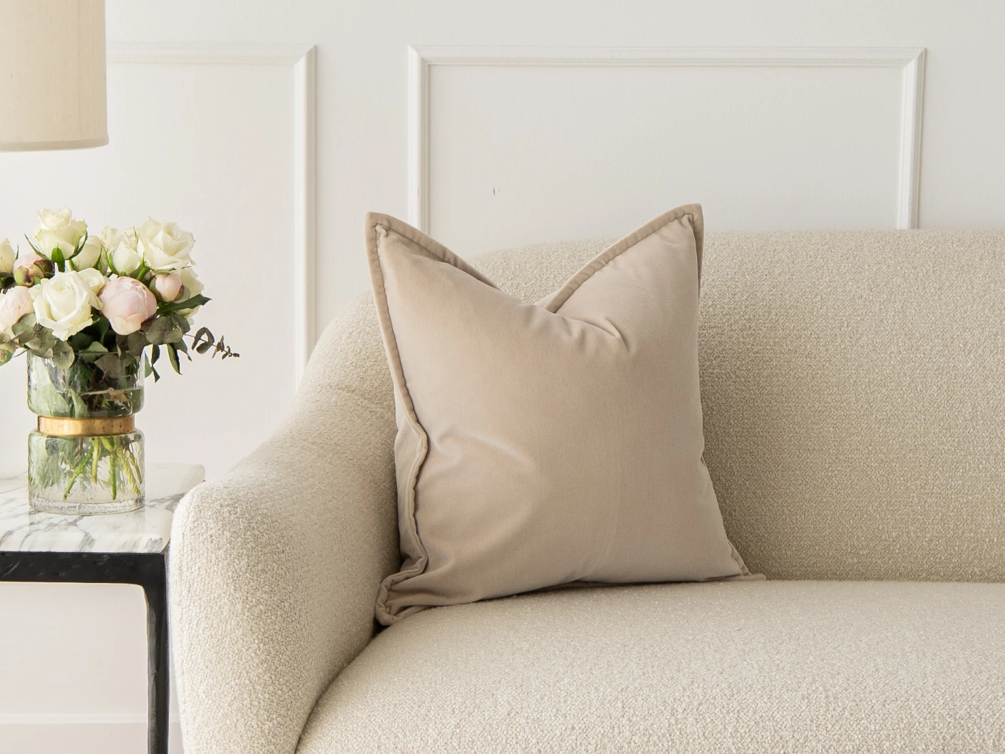 Alessandra River single cushions in beige, shown in a lifestyle front view