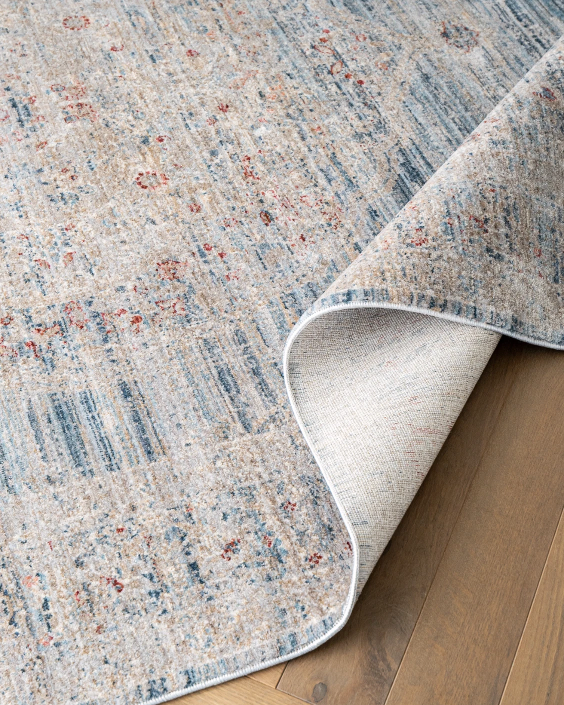 Alexander Sky carpet in pale blue, blue and beige, shown in a product close-up top view as image 12