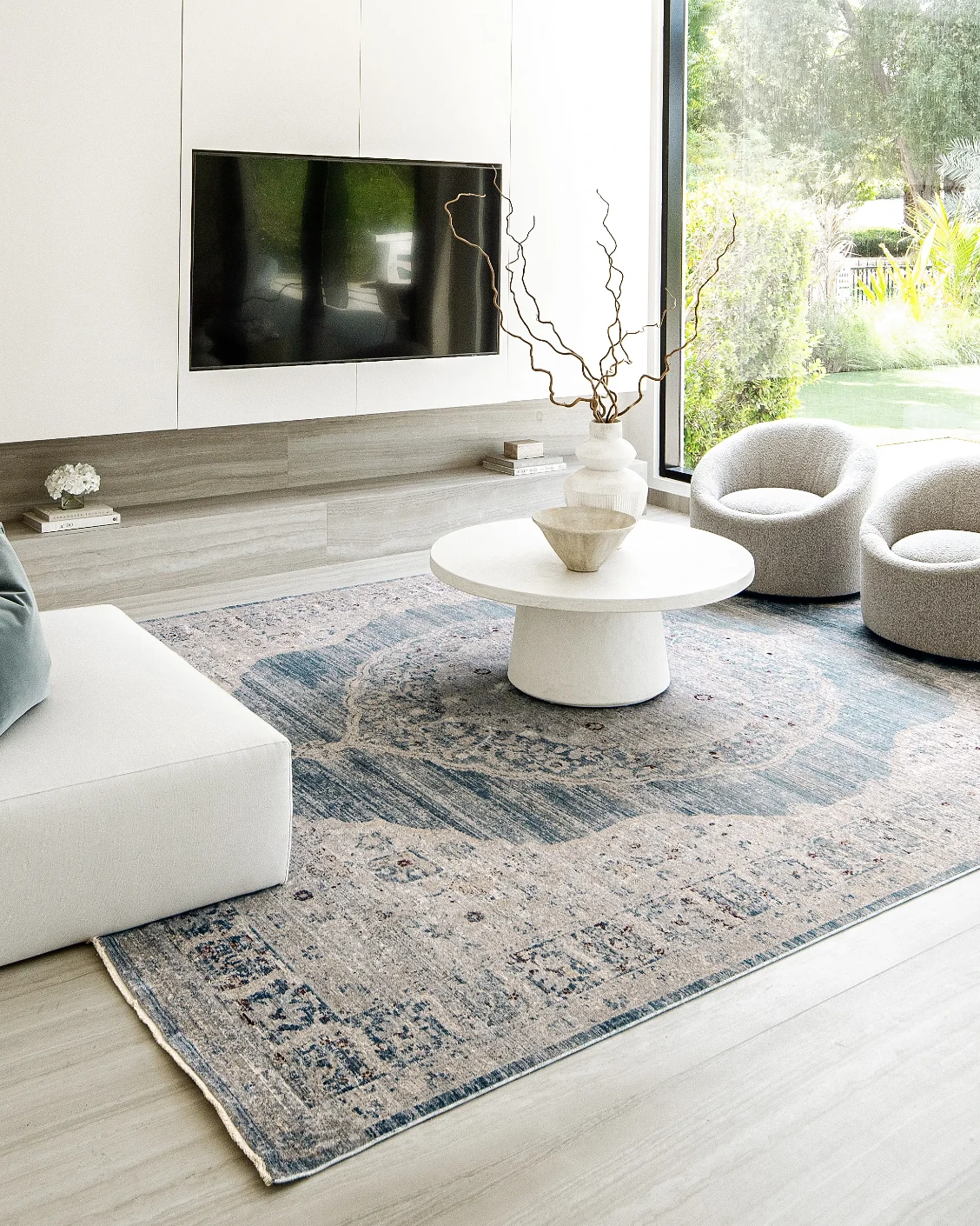 Alexander Sky carpet in pale blue, blue and beige, shown in a product left view as image 14