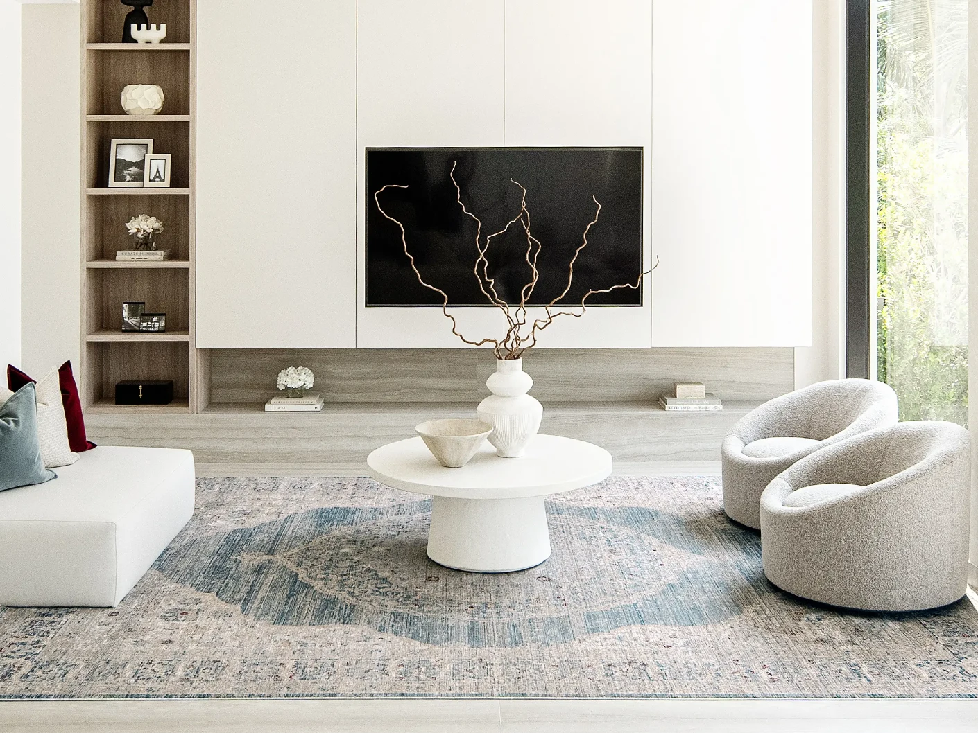 Alexander Sky carpet in sky, pale blue, blue and beige, shown in a lifestyle front view