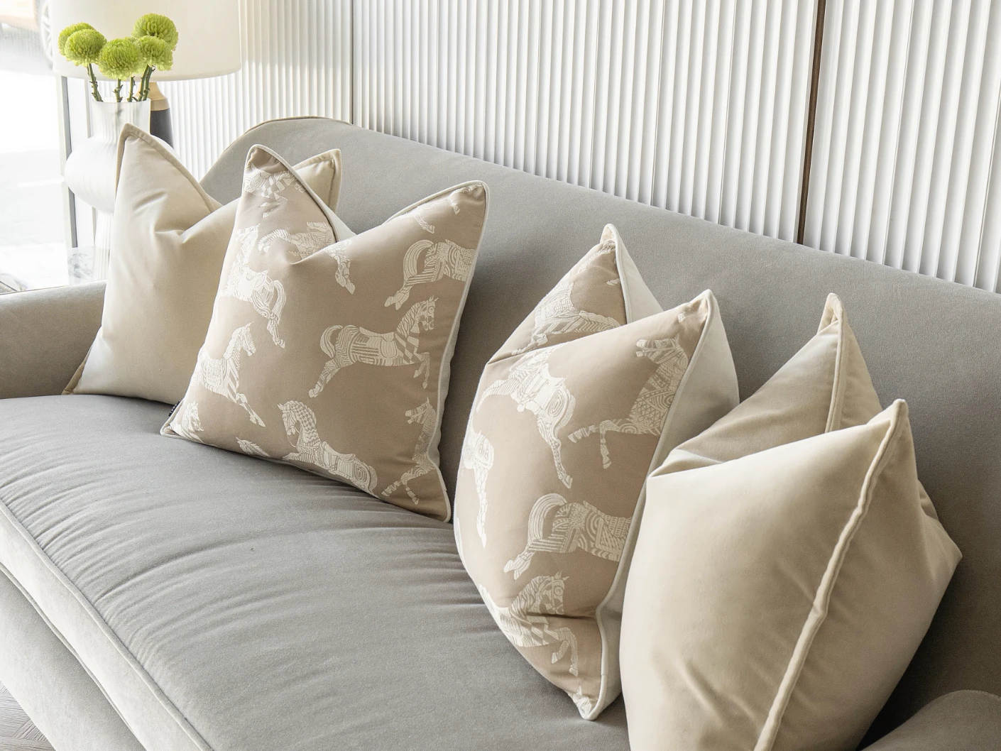 Aura Bundle bundle cushions in beige, shown in a lifestyle front view