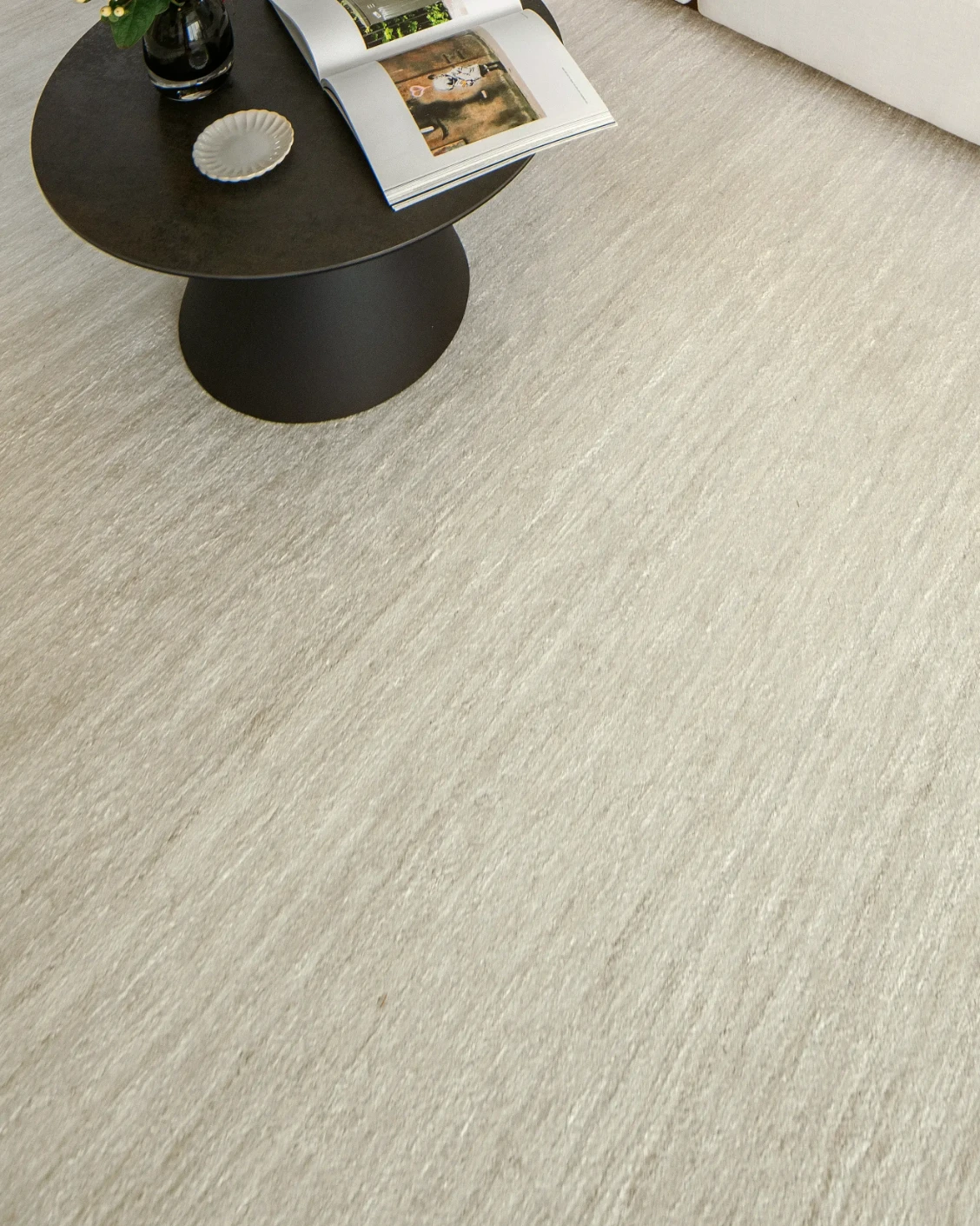 Beatrice Sandy 02 carpet in beige, shown in a lifestyle close-up top view as image 4