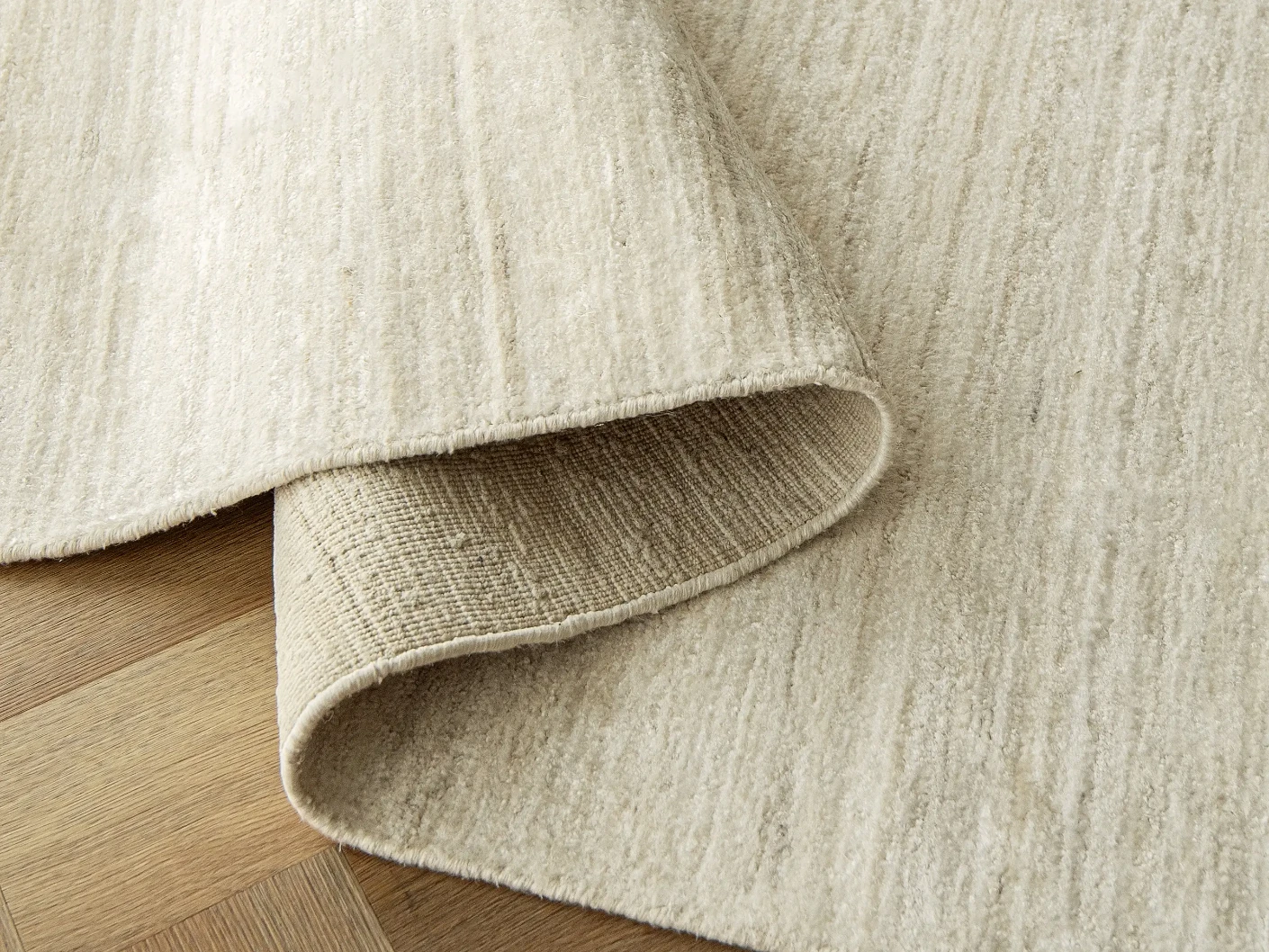 Beatrice Sandy 02 carpets in sandy and beige, shown in a product close-up view