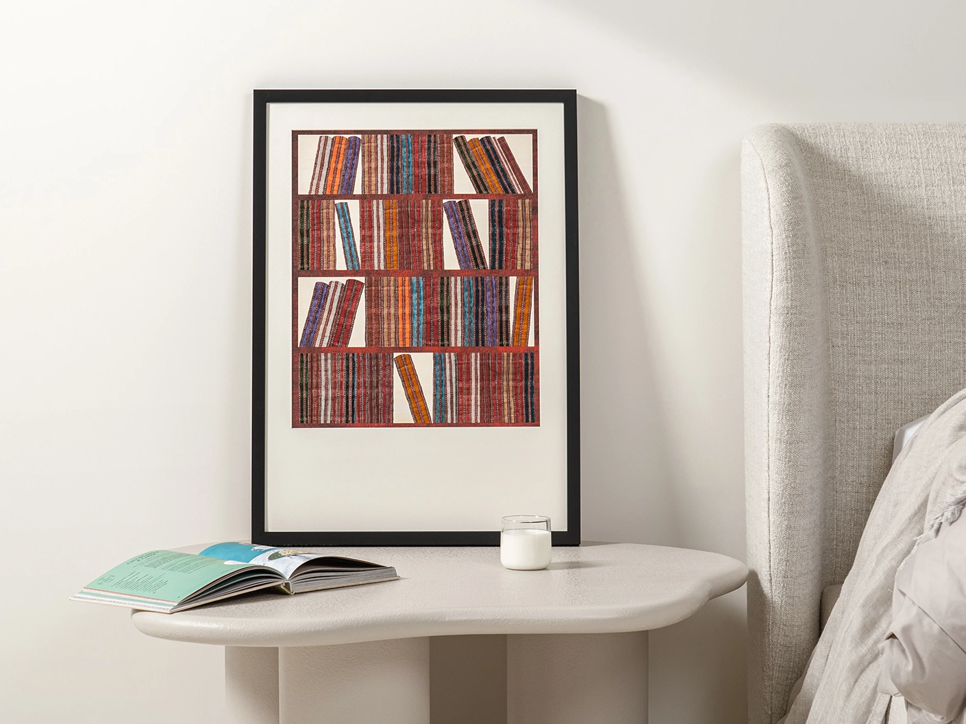 Books fine art print in rust, blue and multicolour, shown in a lifestyle front view as image 3