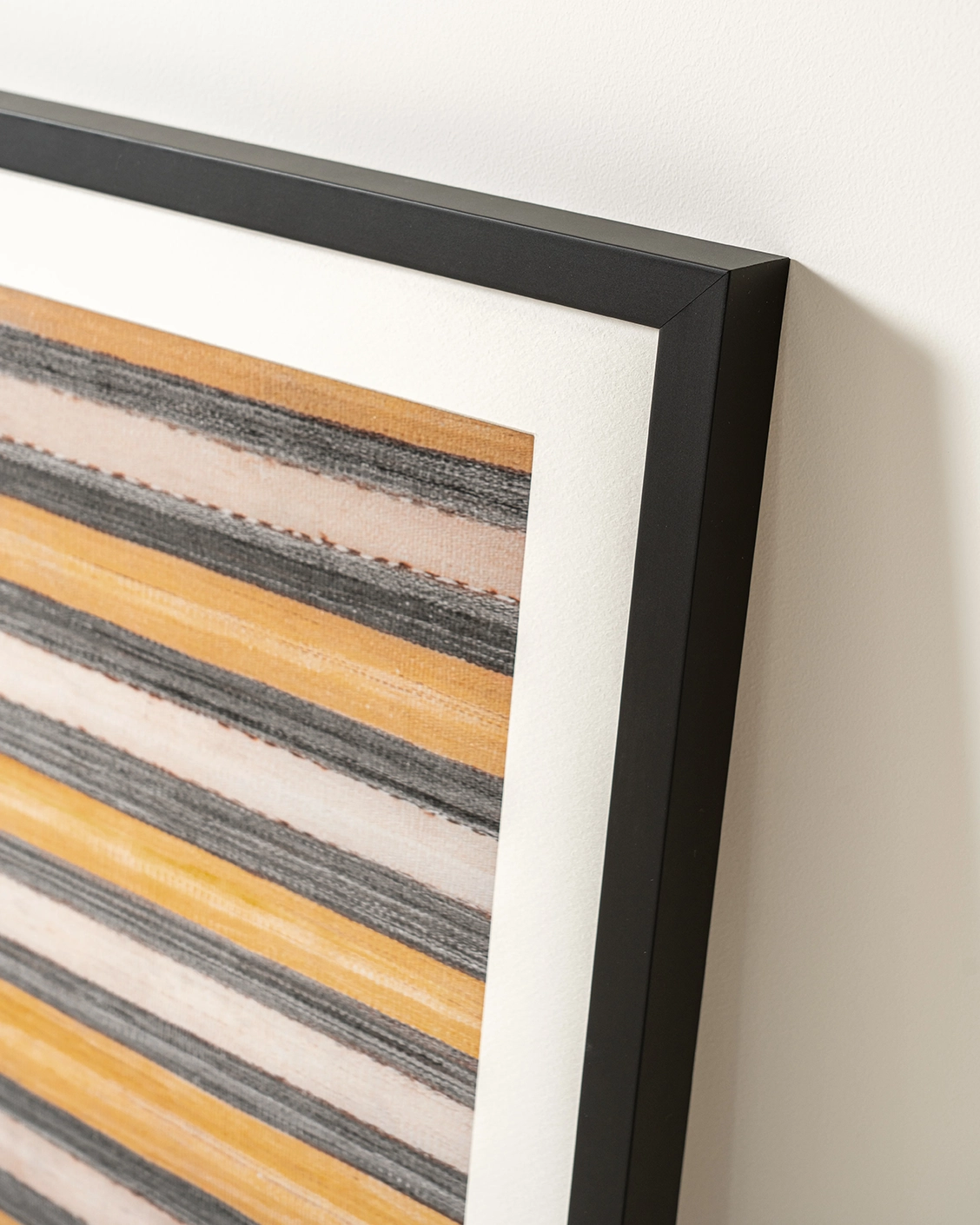 Bumblebee Grey fine art print in grey, beige and yellow, shown in a lifestyle close-up view as image 4