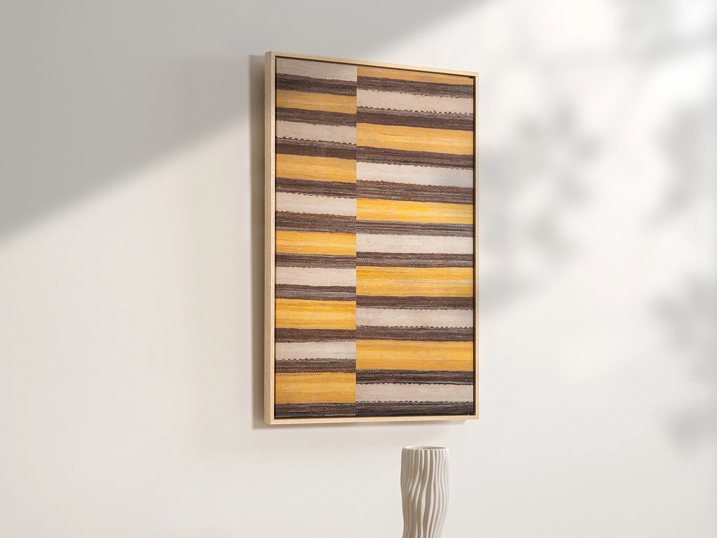 Bumblebee canvas artwork in brown, beige and yellow, shown in a lifestyle left view