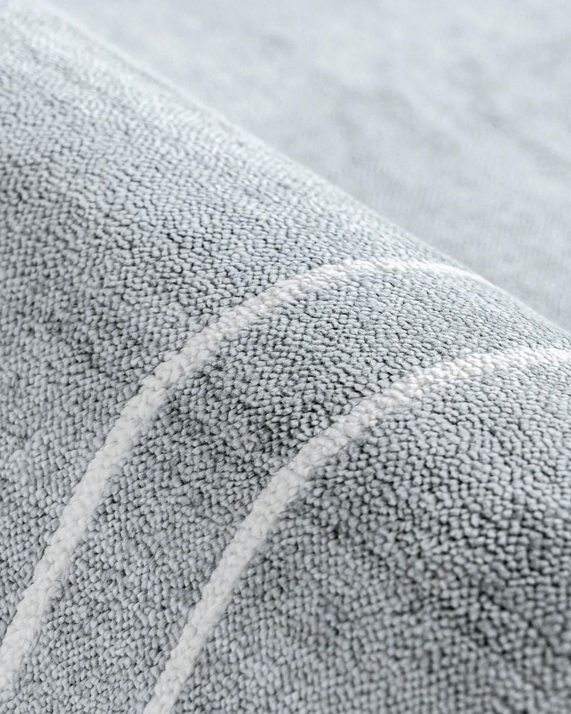Colin Ashton carpet in blue and white, shown in a product close-up as image 10