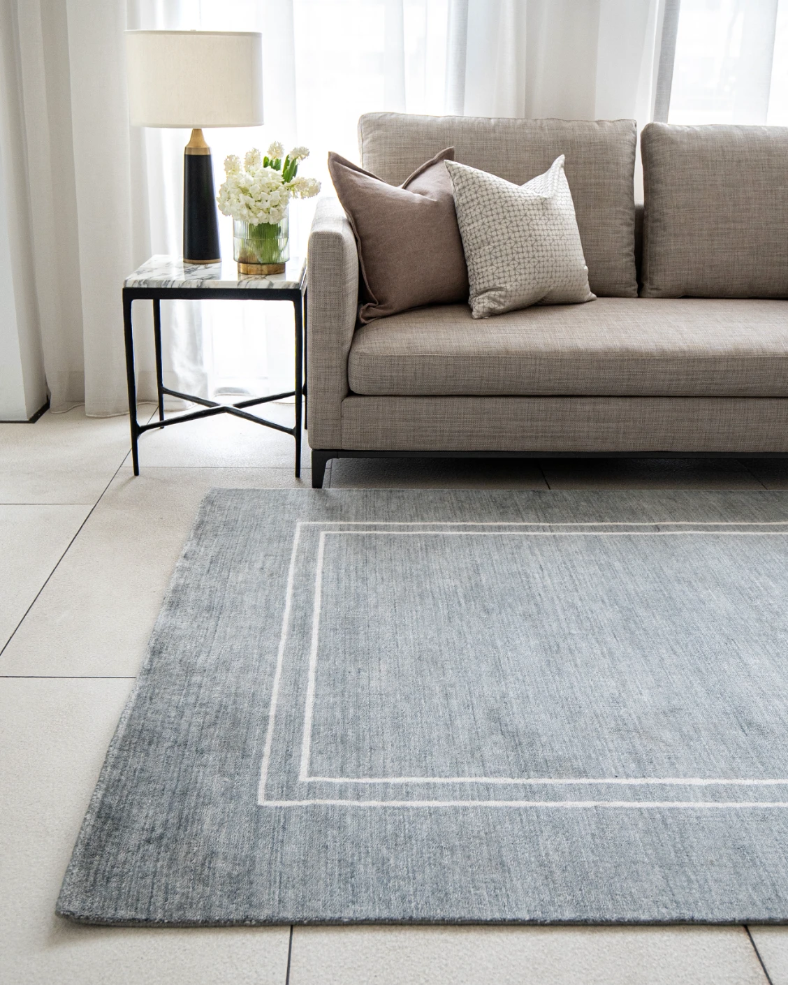 Colin Ashton carpet in blue and white, shown in a lifestyle front view as image 2