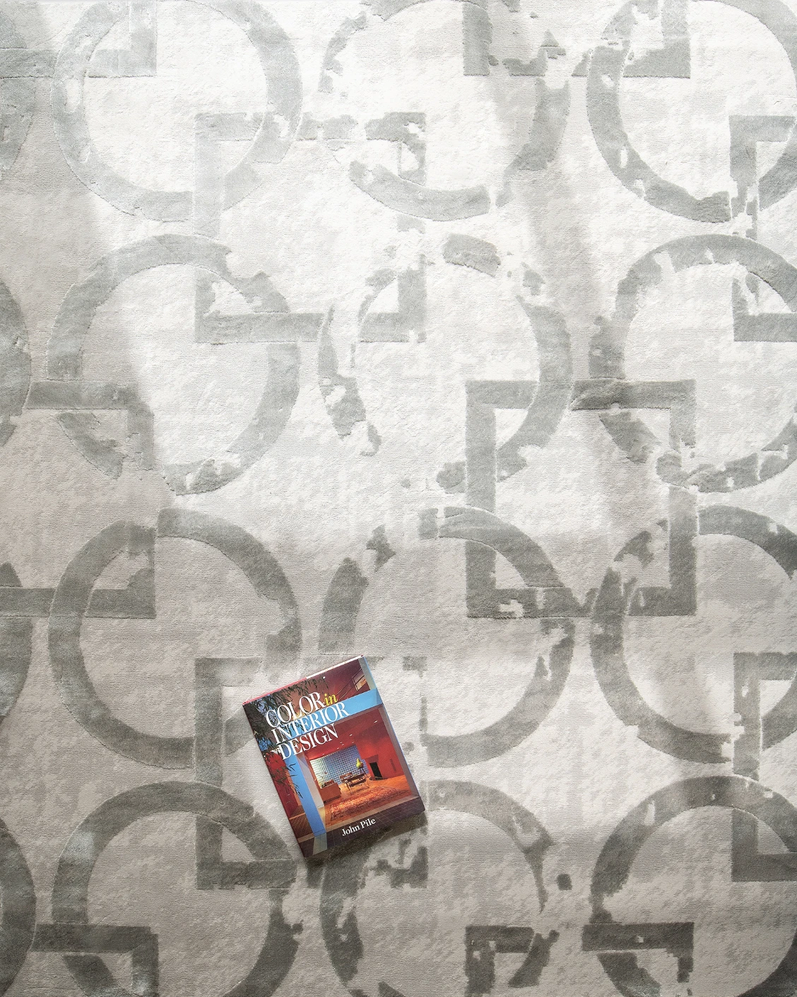 Cooper Dune carpet in dune, grey and silver, shown in a lifestyle top view as image 7