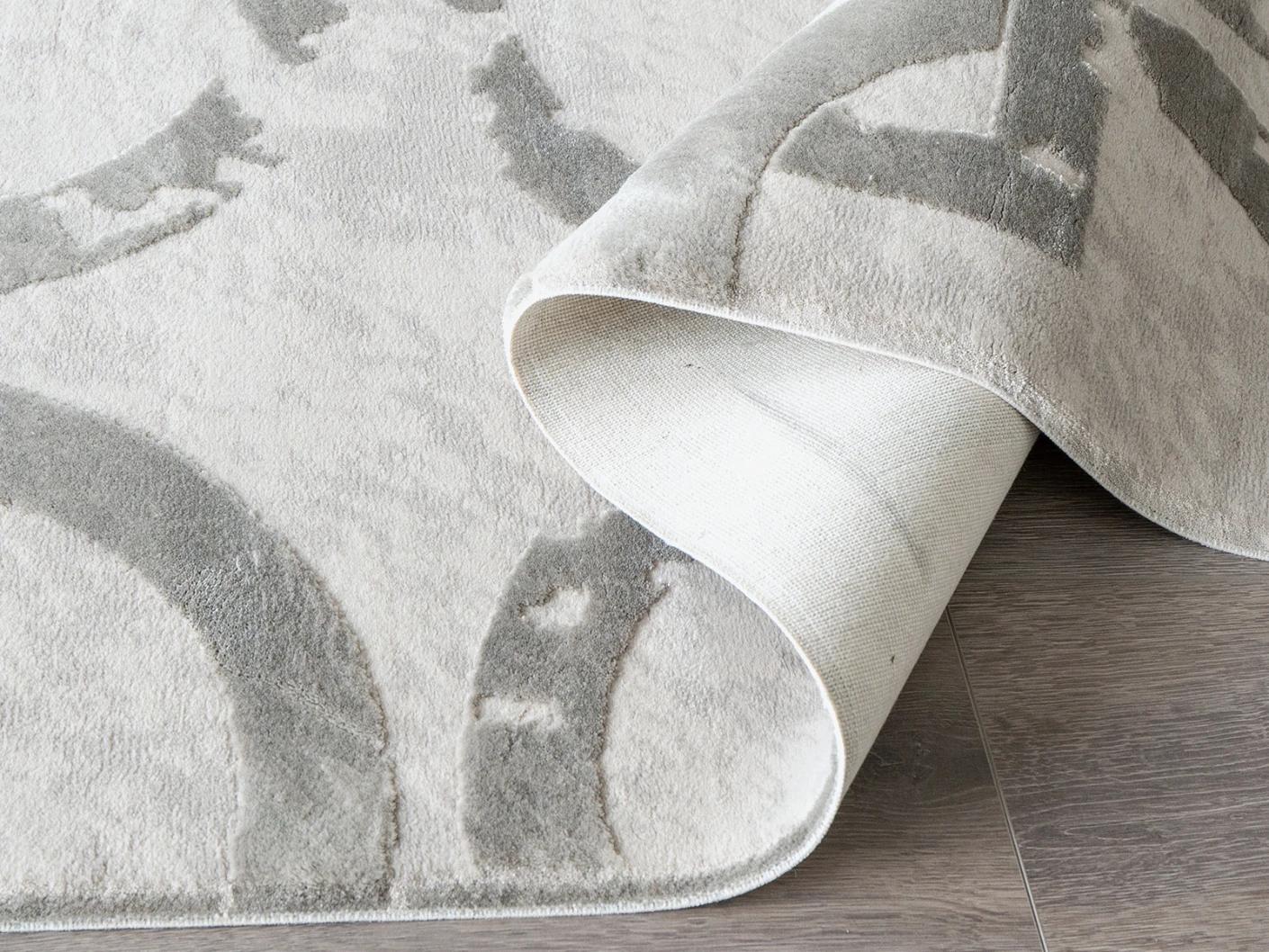 Cooper Dune carpets in dune, grey and silver, shown in a product close-up view
