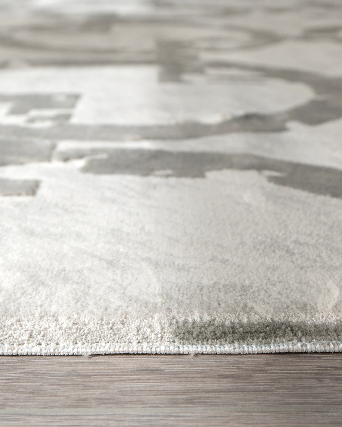 Cooper Dune carpet in dune, grey and silver, shown in a product close-up as image 10