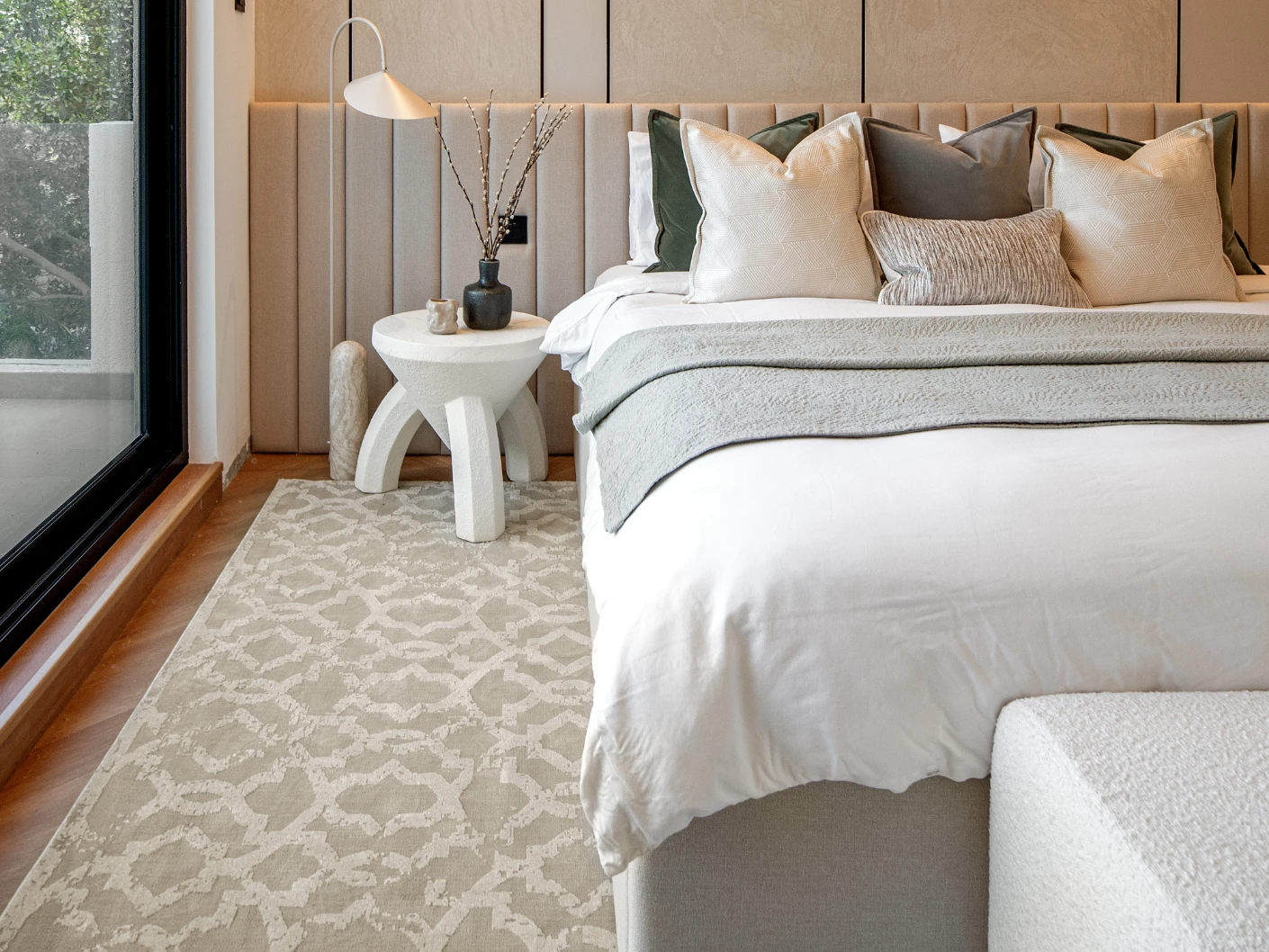 Cooper Sandy carpet in sandy, beige and ivory, shown in a lifestyle front view