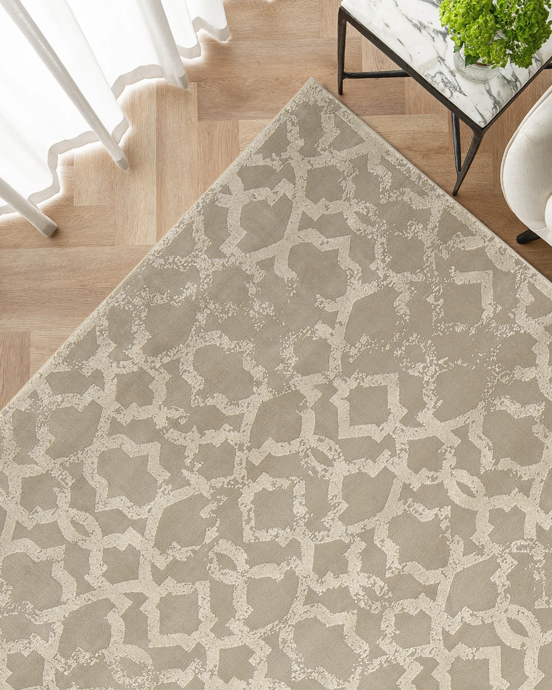 Cooper Sandy carpet in sandy, beige and ivory, shown in a lifestyle top view as image 2