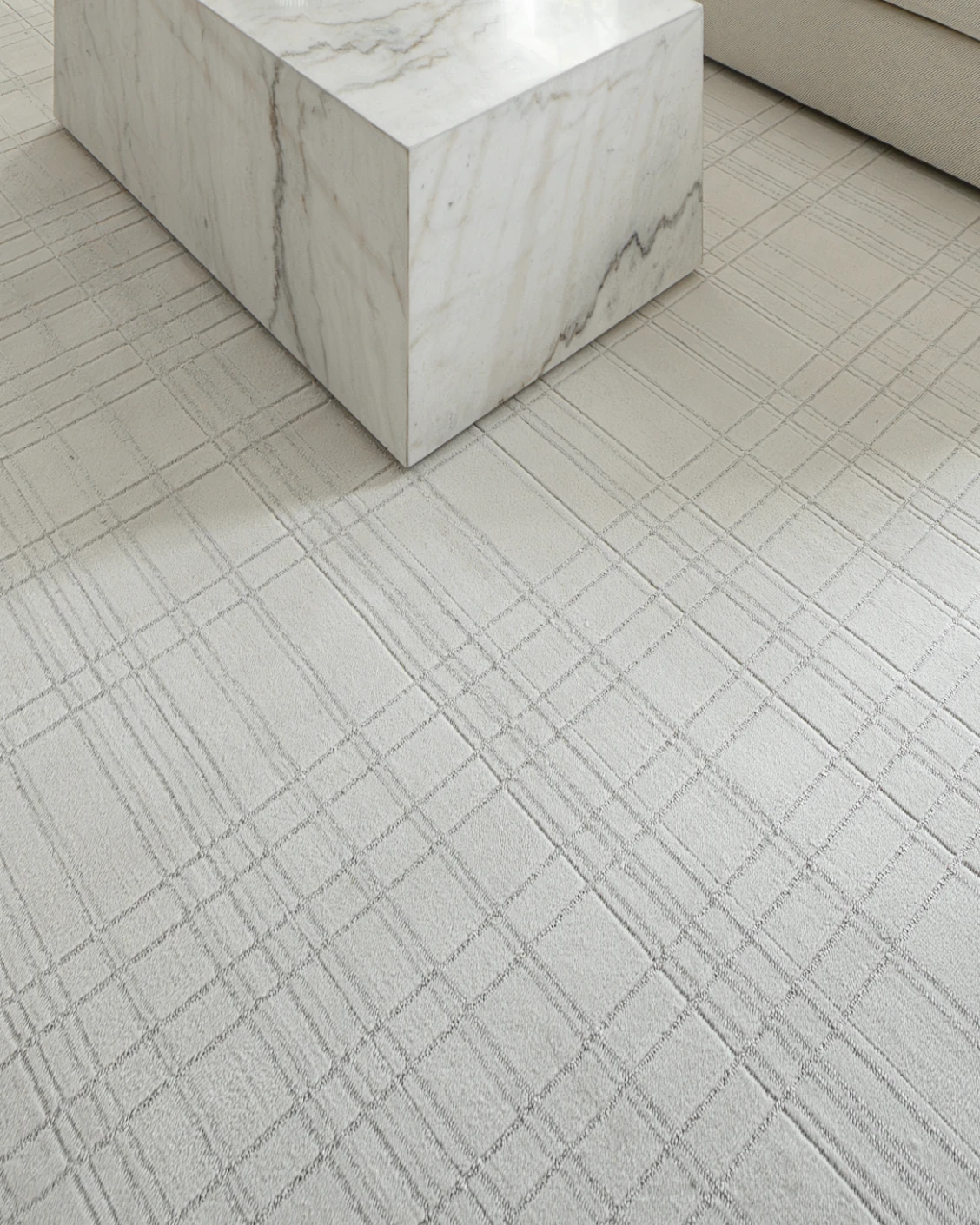Corvin Sandy carpet in ivory and grey, shown in a lifestyle close-up as image 4