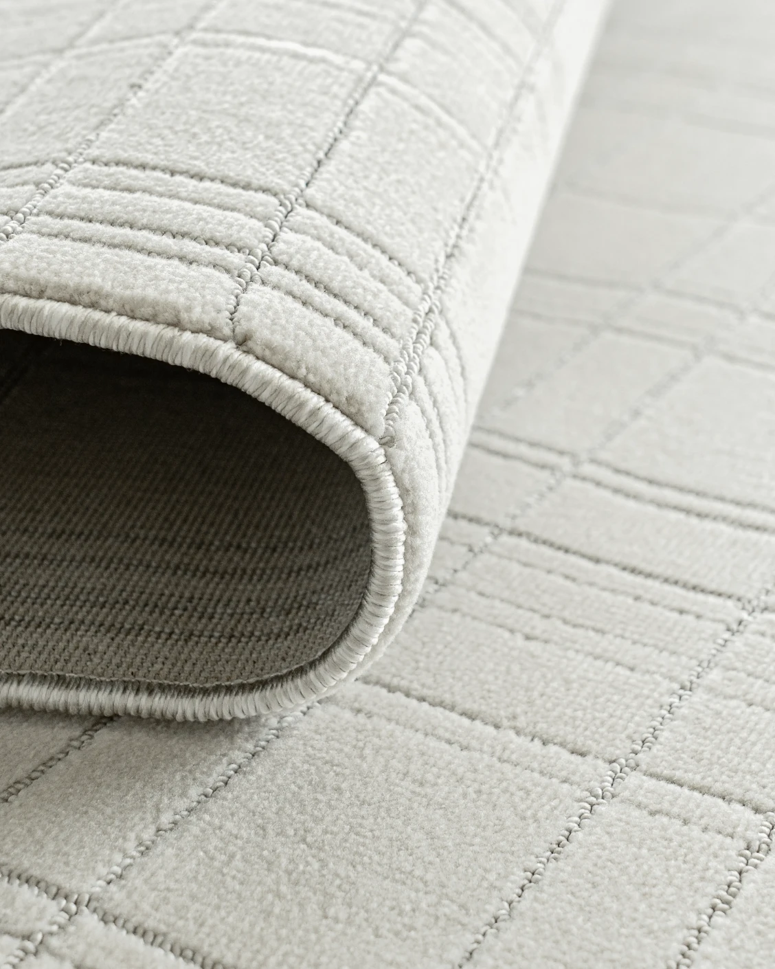Corvin Sandy carpet in ivory and grey, shown in a product close-up as image 11