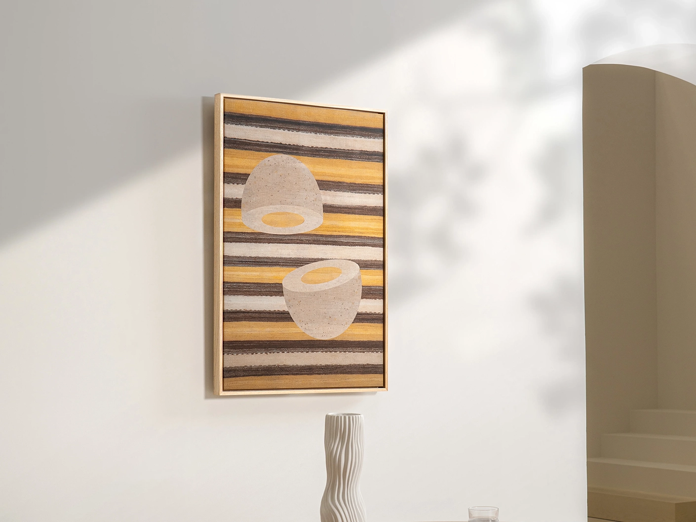 Eggsercise canvas artwork in yellow, brown and beige, shown in a lifestyle left view