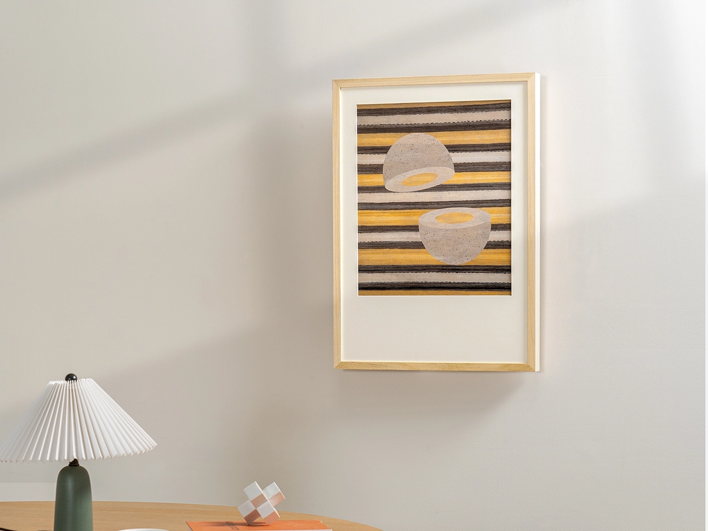Eggsercise fine art print artwork in yellow, brown and beige, shown in a lifestyle left view