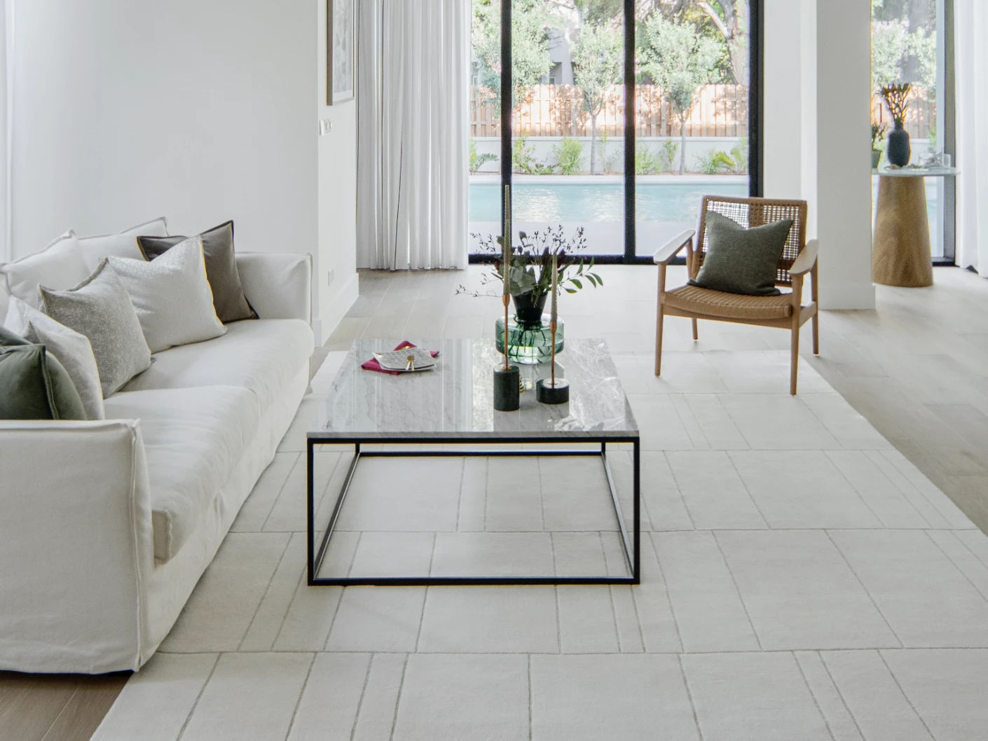 Elliot Bianca carpet in white and pearl, shown in a lifestyle front view