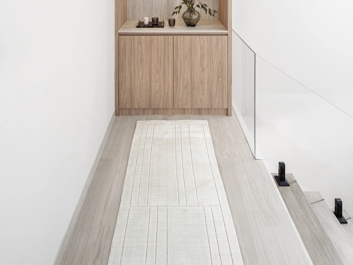 Elliot Bianca Runners carpet in white and pearl, shown in a lifestyle front view
