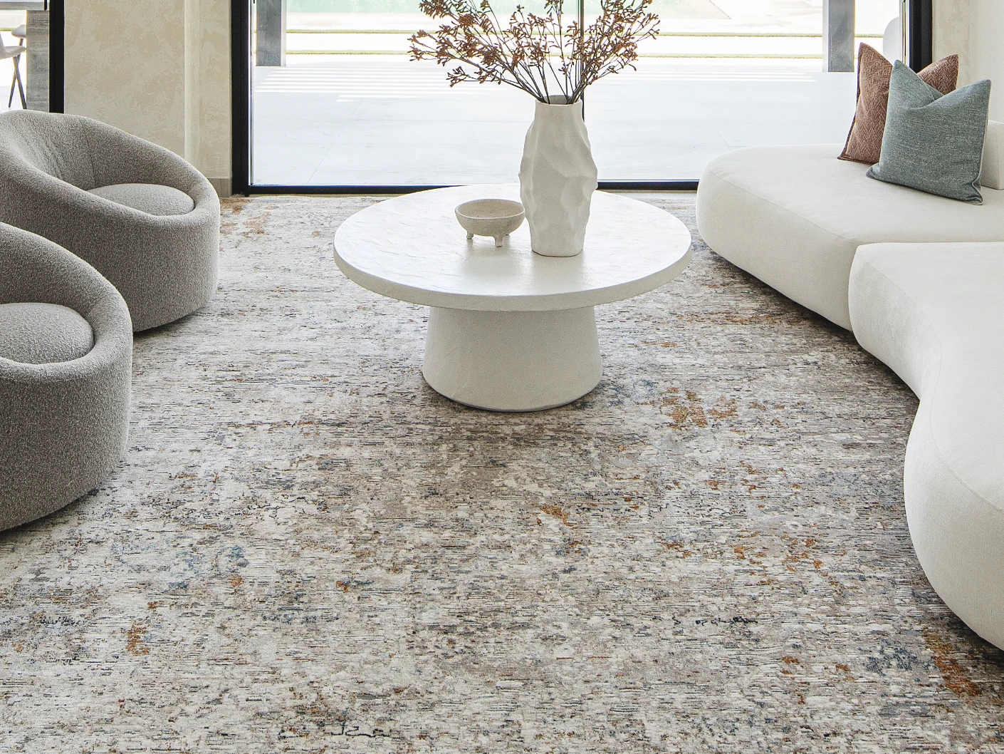 Ethan Brick carpet in gold and grey, shown in a lifestyle front view