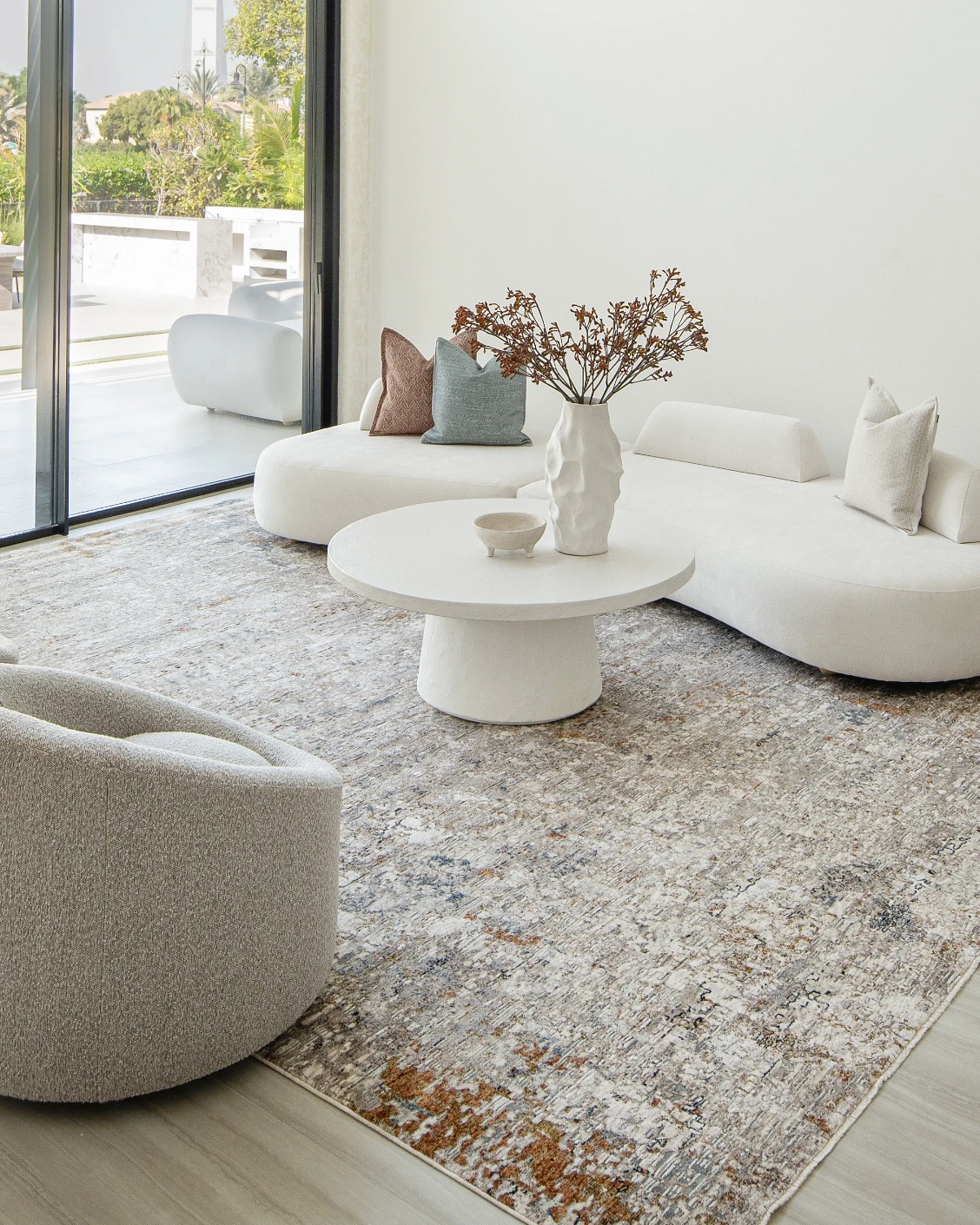 Ethan Brick carpet in gold and grey, shown in a lifestyle right view as image 7