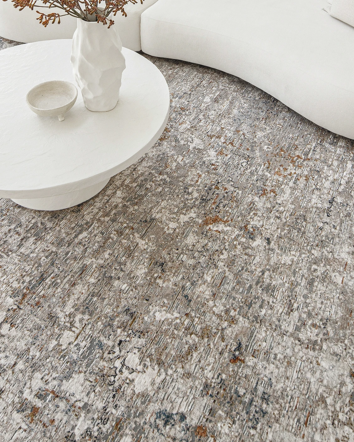 Ethan Brick carpet in gold and grey, shown in a lifestyle top view as image 9