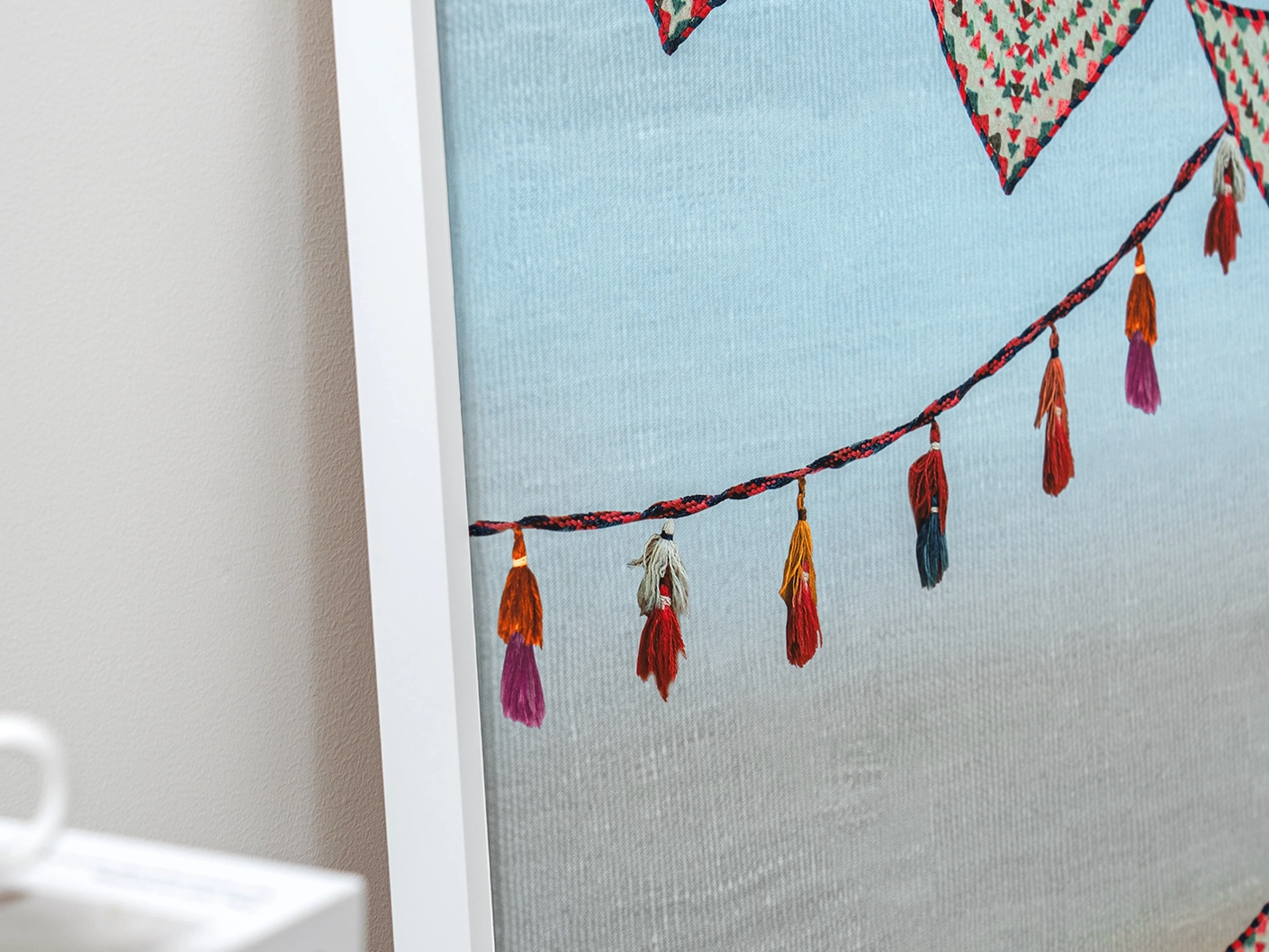 Fiesta canvas in multicolour and blue, shown in a lifestyle close-up as image 2