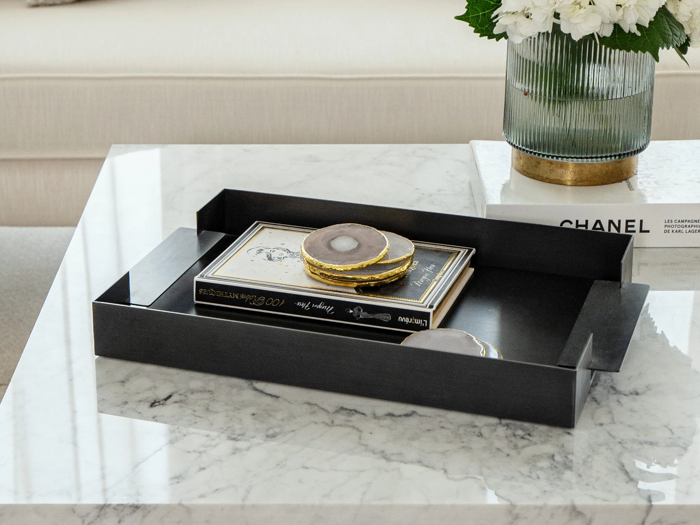 Frank Bandiagara trays in grey, shown in a lifestyle top view