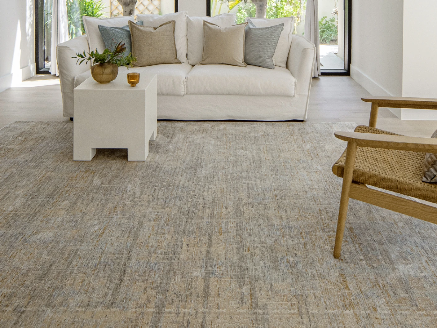 Hana Goldberg carpet in gold, shown in a lifestyle front view