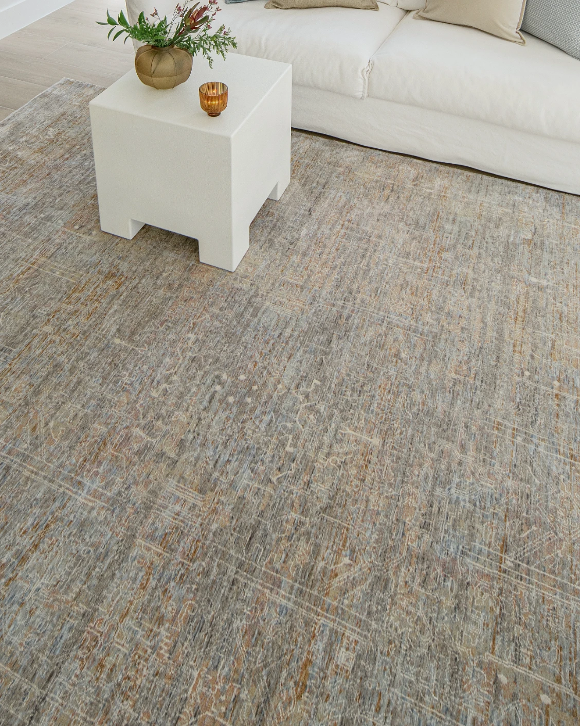 Hana Goldberg carpet in gold, shown in a lifestyle top view as image 10