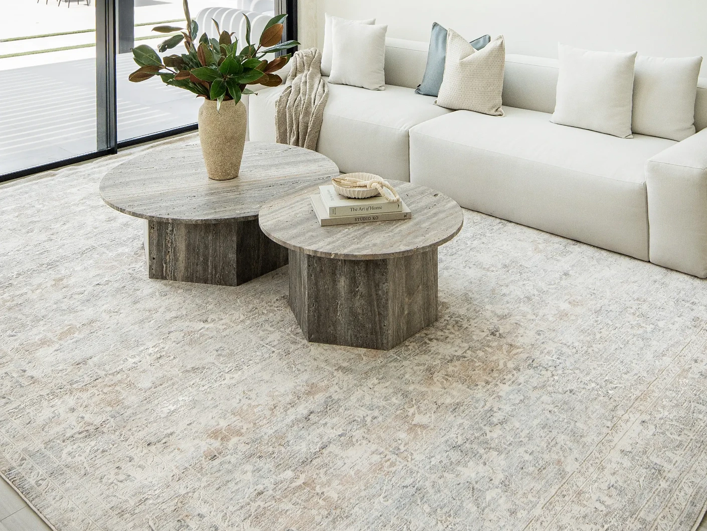 Hana Sandy carpet in sandy, beige and taupe, shown in a lifestyle front view