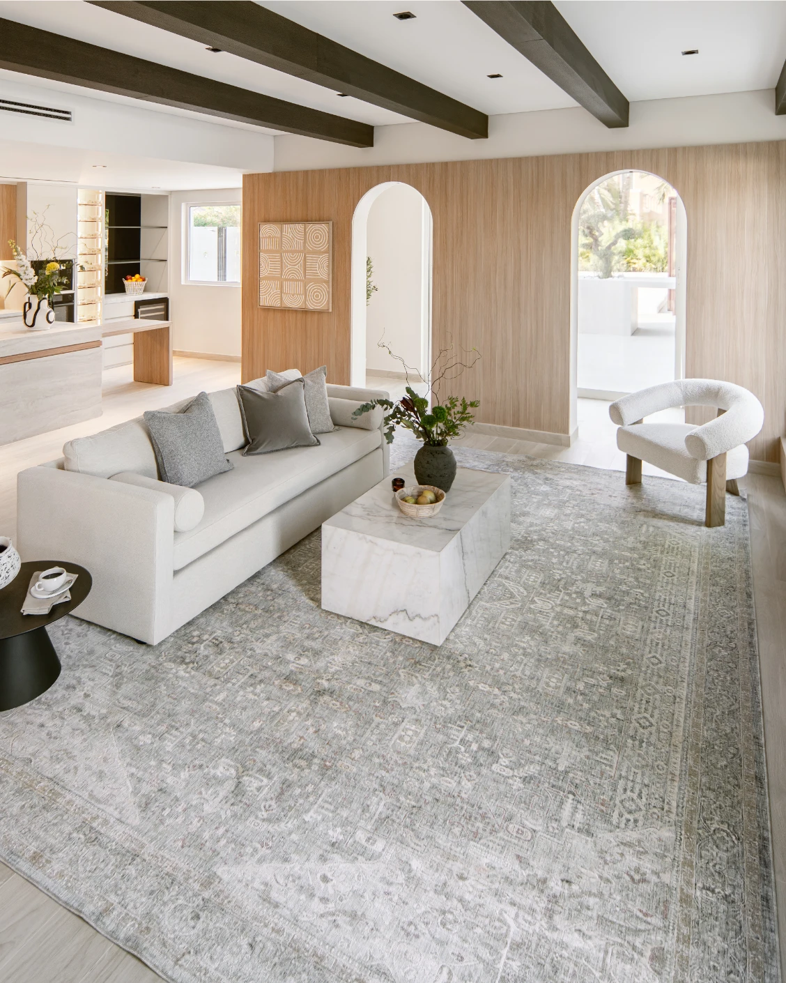 Hana Sky carpet in blue and grey, shown in a lifestyle front view as image 5