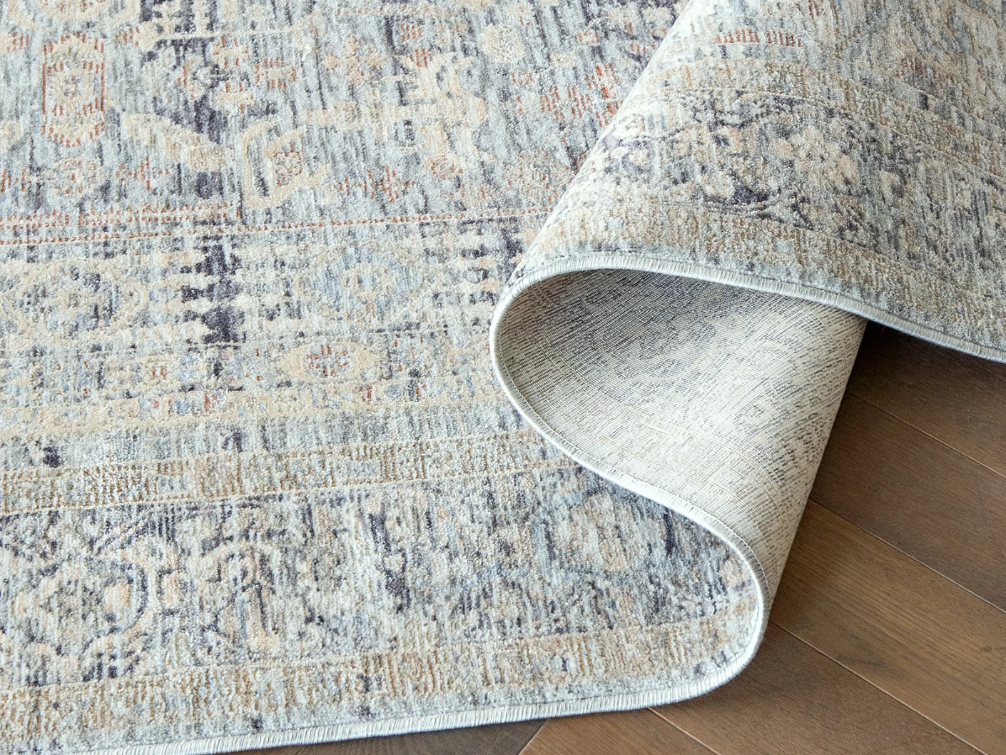 Hana Sky carpets in sky, blue and grey, shown in a product close-up view