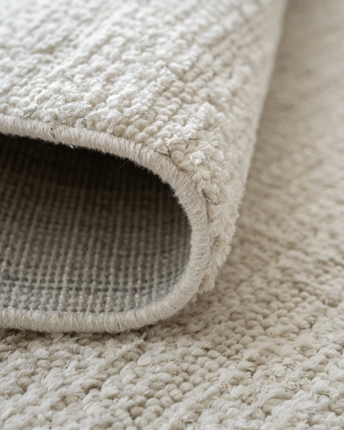 Henry Bianca carpet in ivory and pearl, shown in a product close-up as image 11
