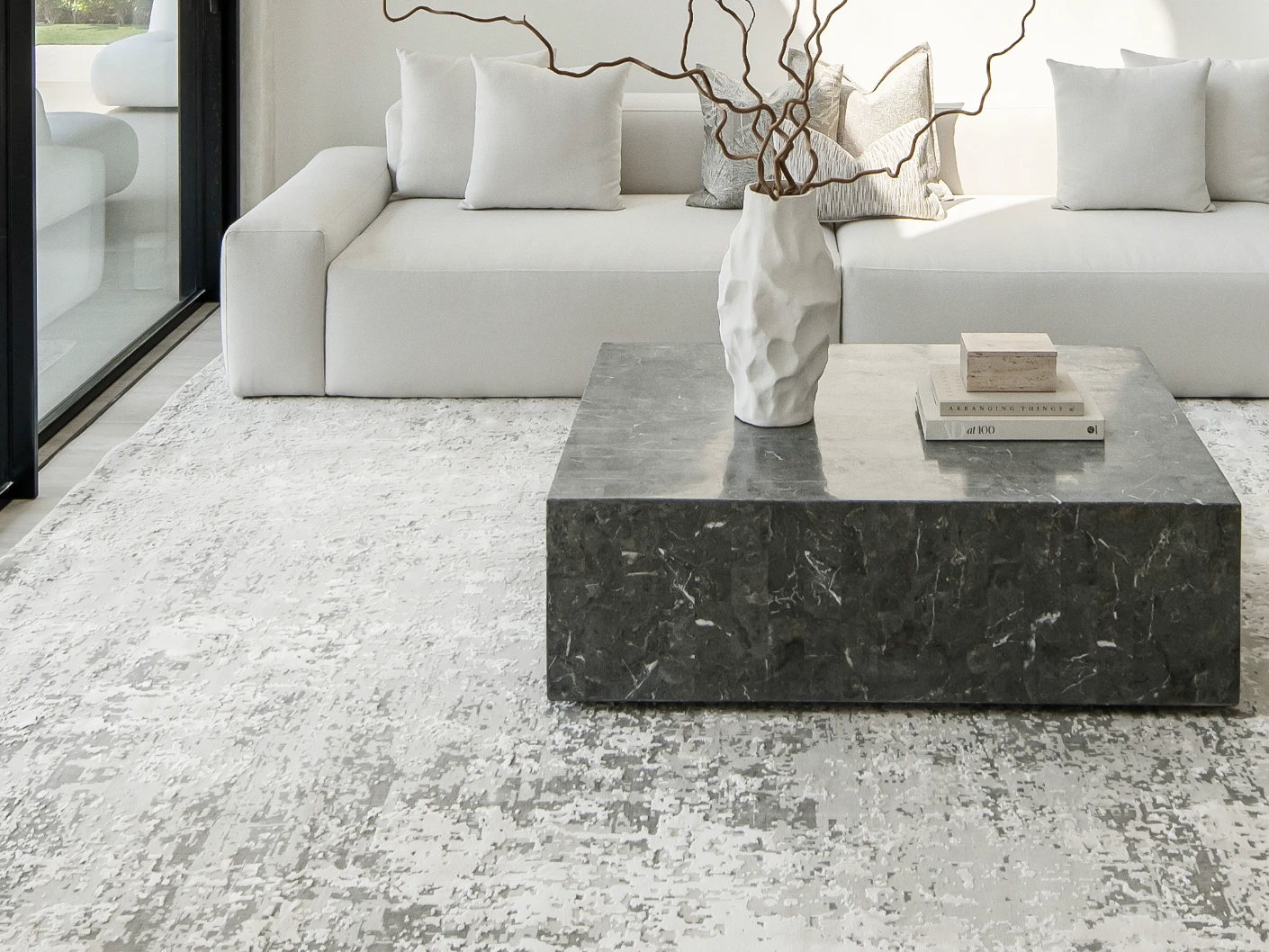 Jay Ashton carpet in grey, shown in a lifestyle front view