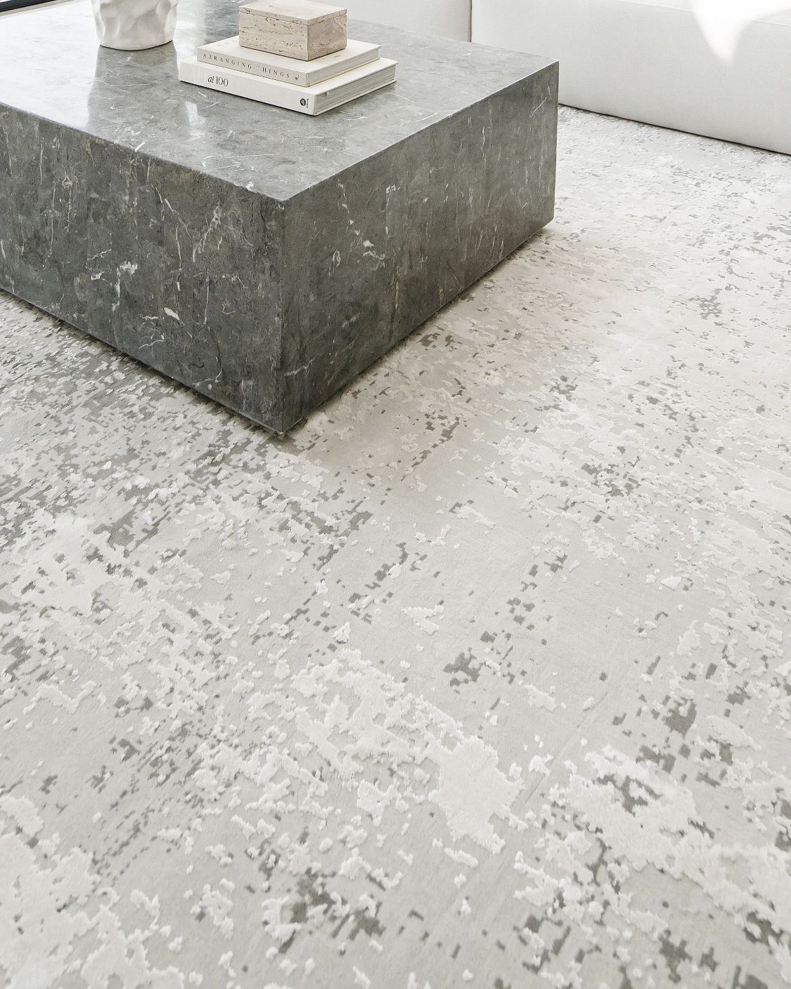 Jay Ashton carpet in grey, shown in a lifestyle close-up as image 9