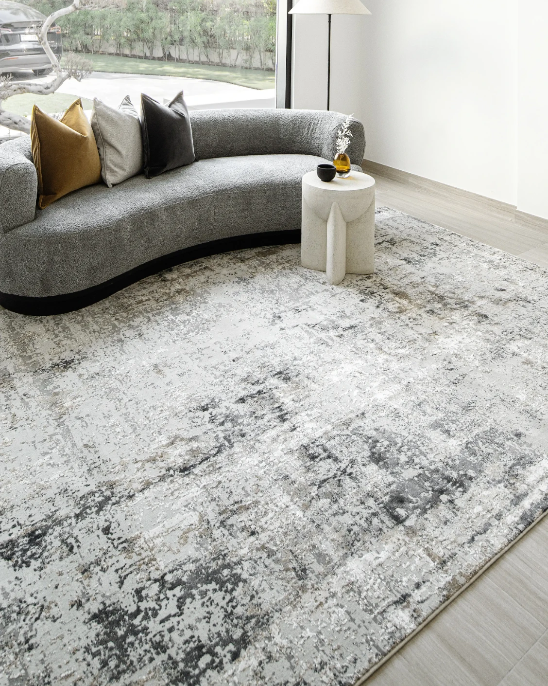 Jay Haywoods carpet in grey, shown in a lifestyle left view as image 5