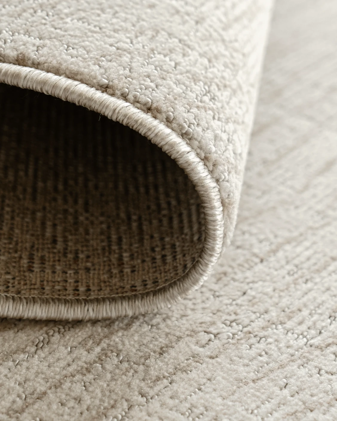 Link Sandy Round carpet in sandy and beige, shown in a product close-up as image 6