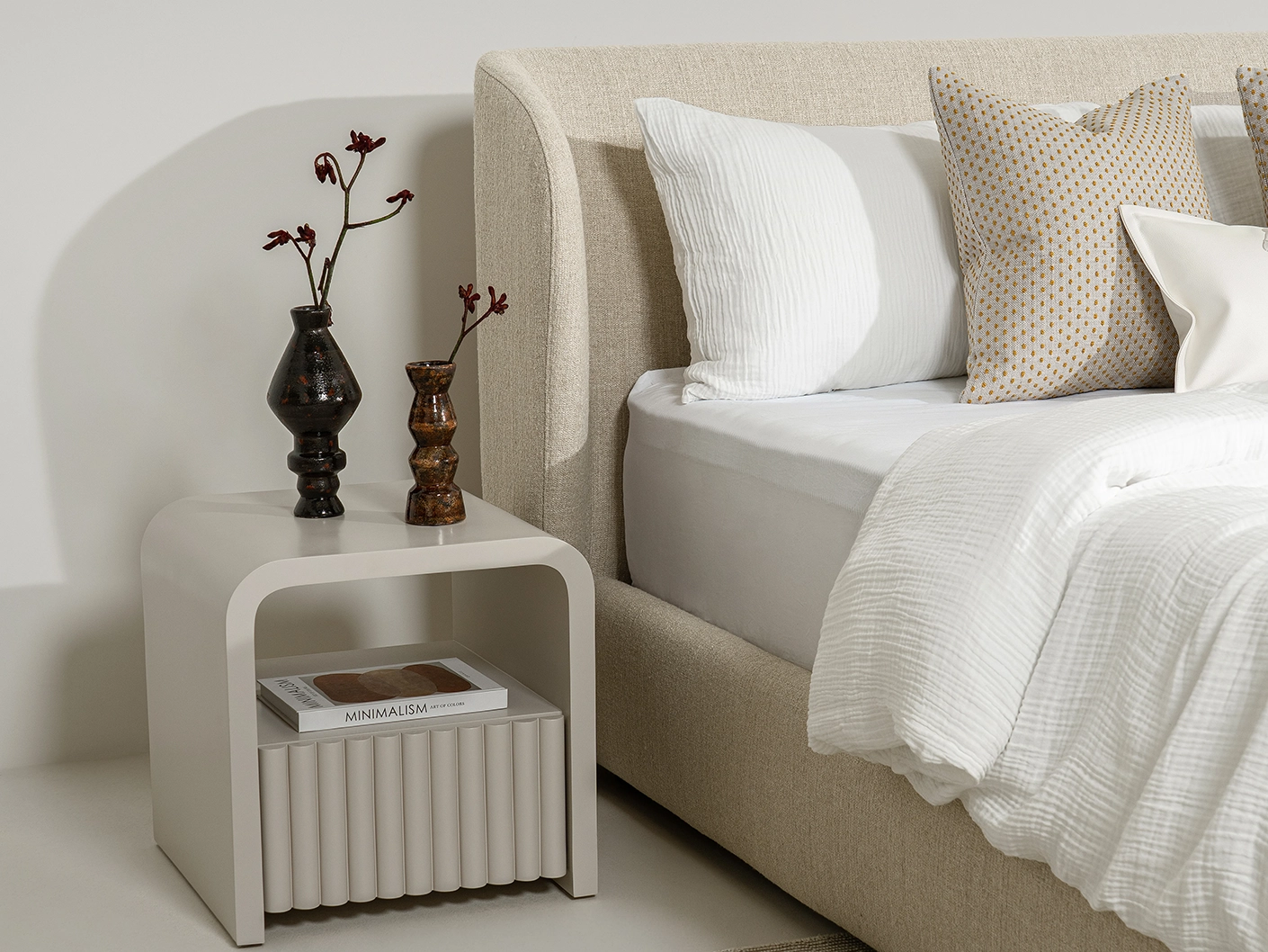 Livia Warm Mushroom bed frame, shown in a lifestyle left view as image 2