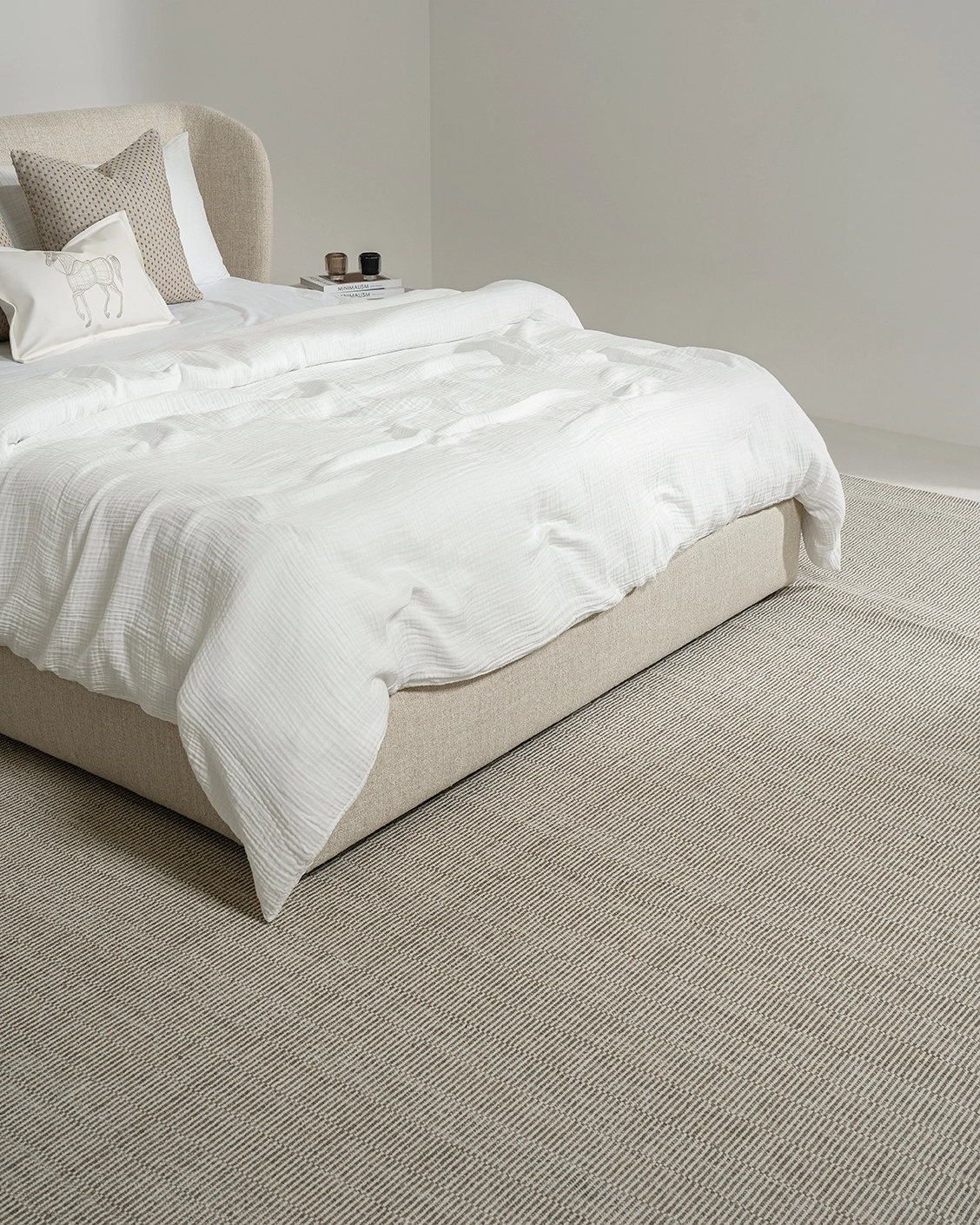 Livia Warm Mushroom bed frame, shown in a lifestyle top view as image video image