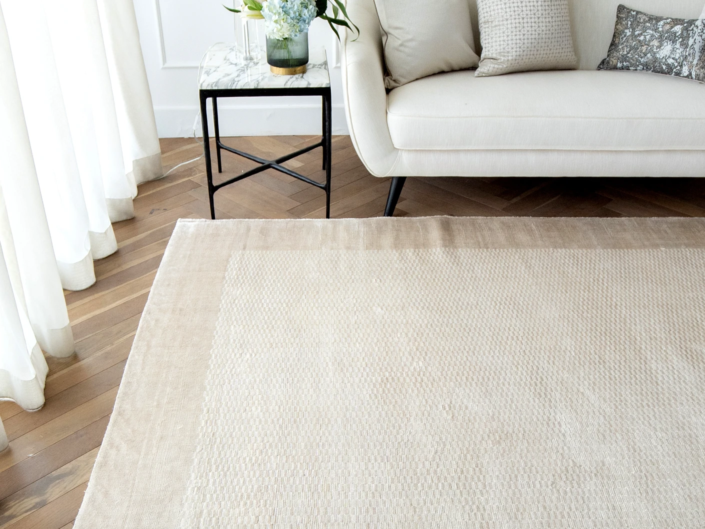 Luna Clay carpet in clay and beige, shown in a lifestyle front view