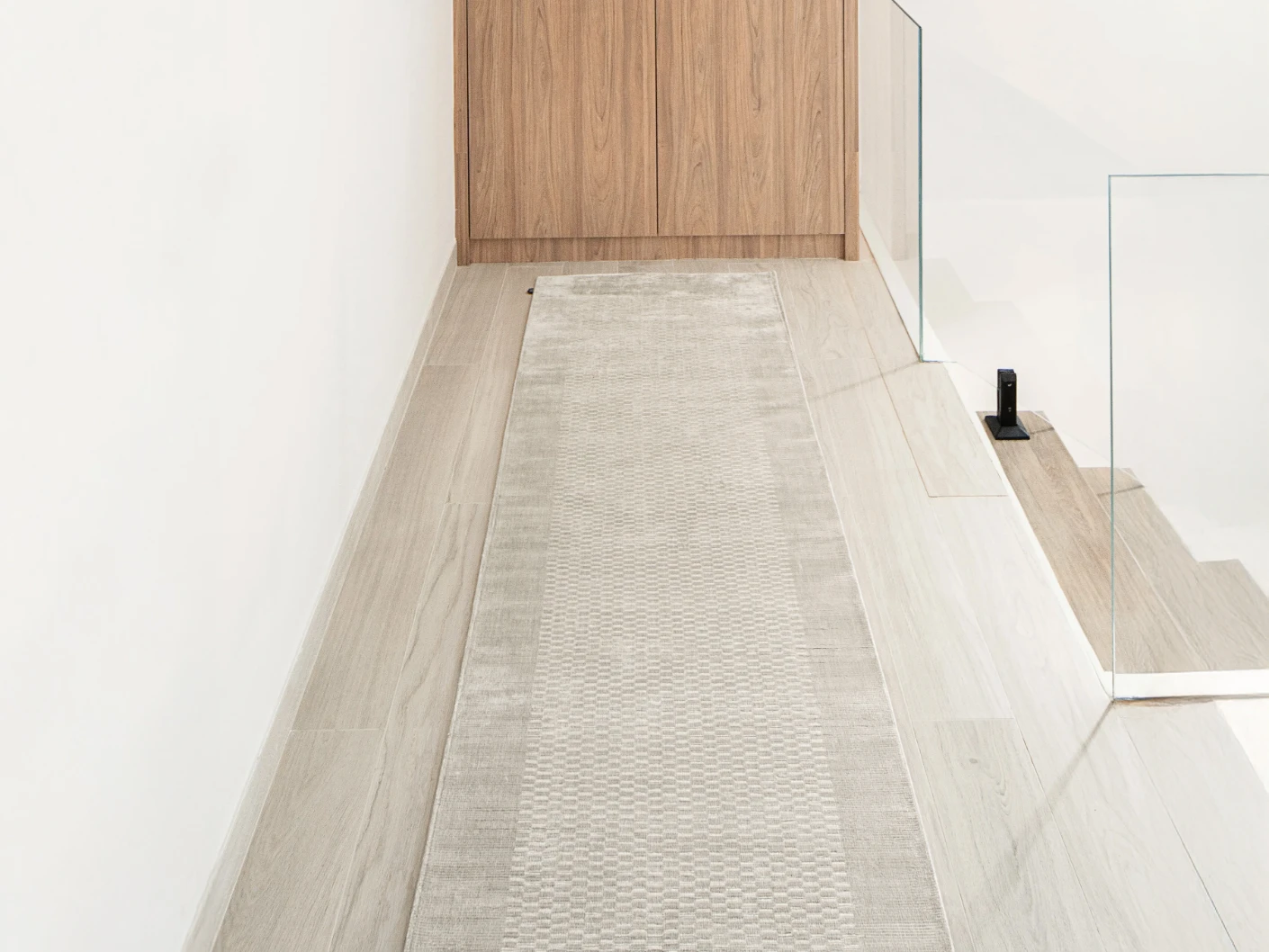 Luna Clay Runners carpet in beige, shown in a lifestyle front view